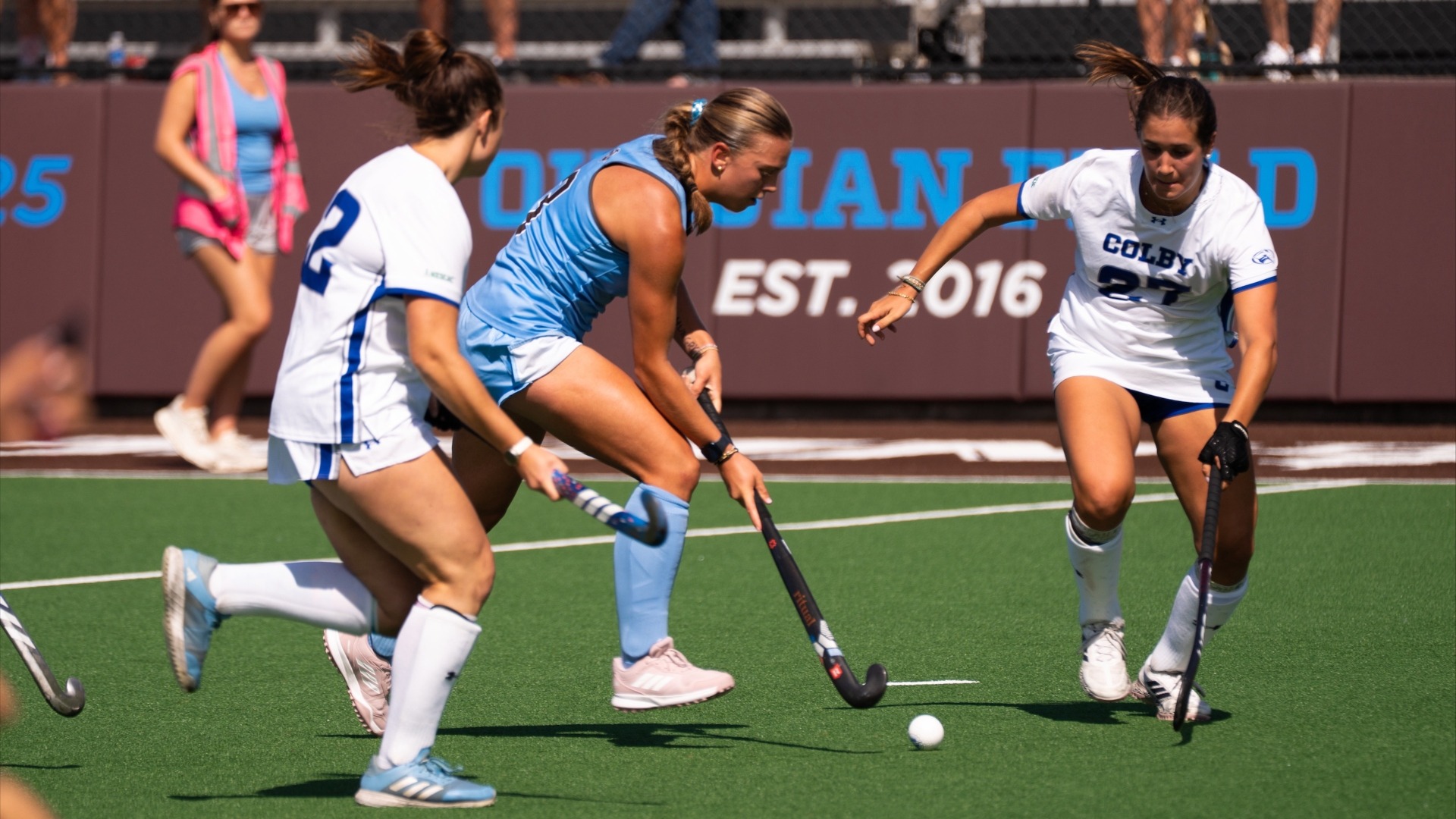 Eleanor Helm moves the ball upfield against Colby College.