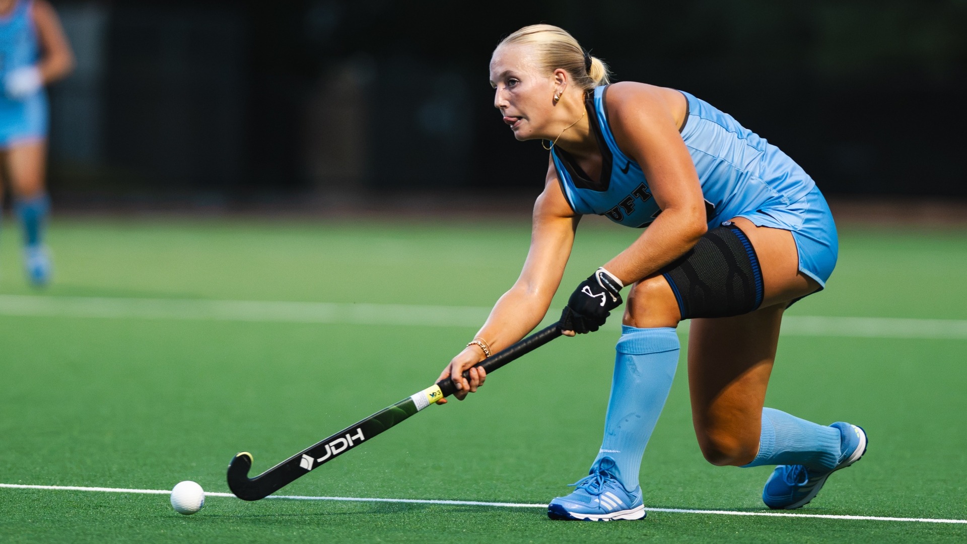 Eleanor Luft is set to restart the action in Tufts' game against Trinity.