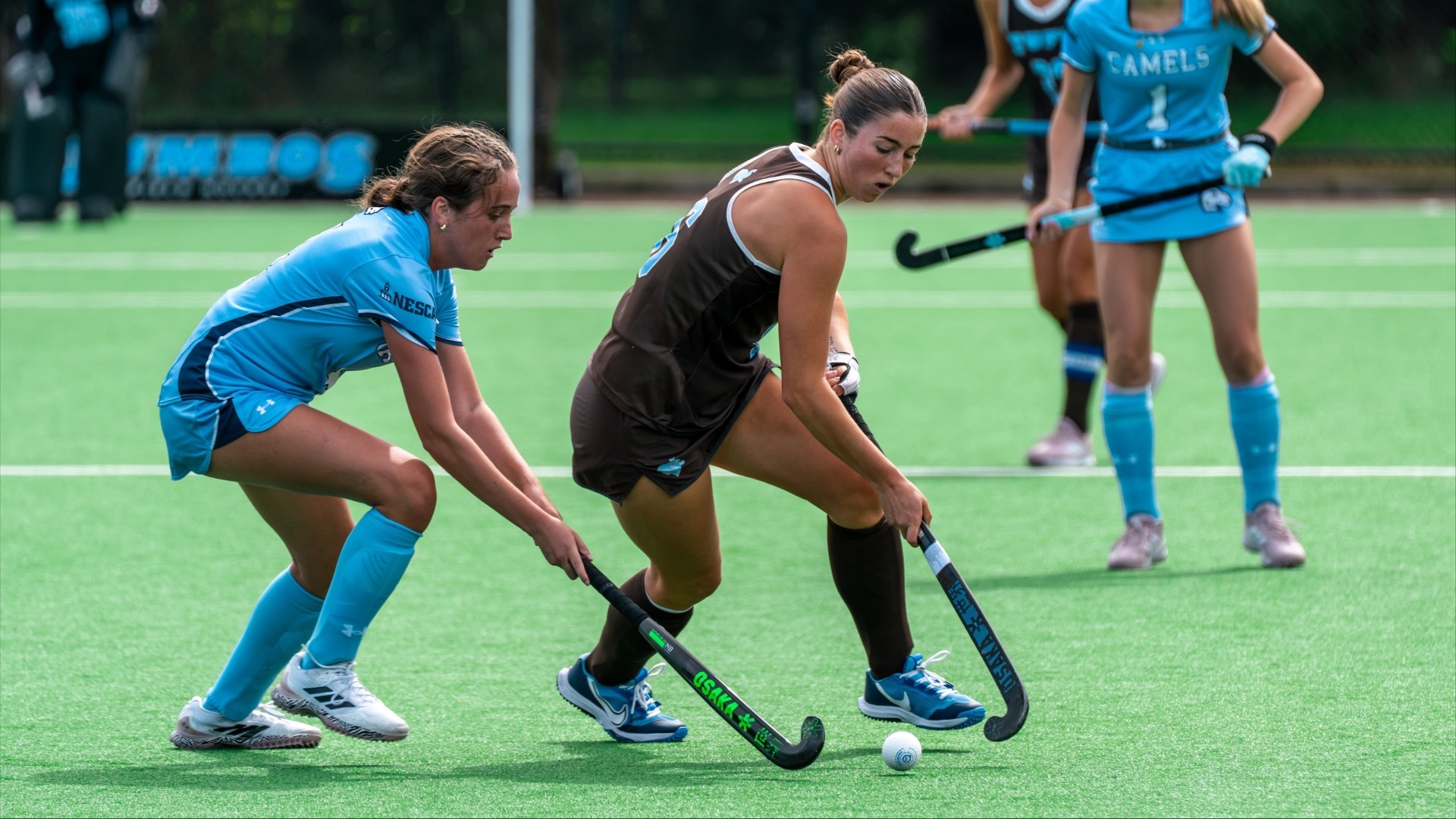Kate Wahler stickhandles past a Connecticut College defender.