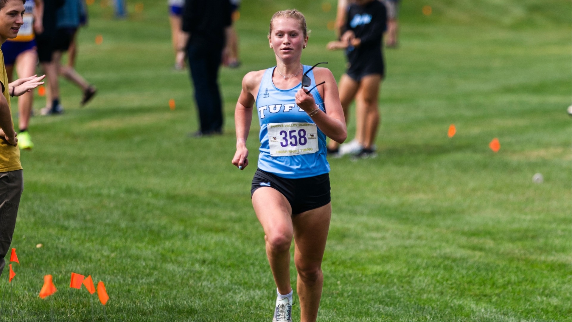 Lily Simmonds runs to fourth place at the Purple Valley Classic.