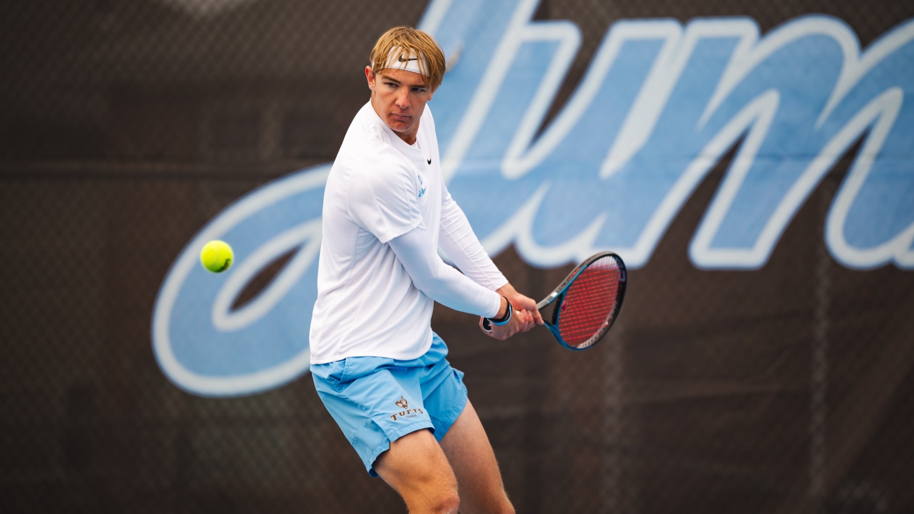 Matej Djokic Hits Shot Against Trinity College.