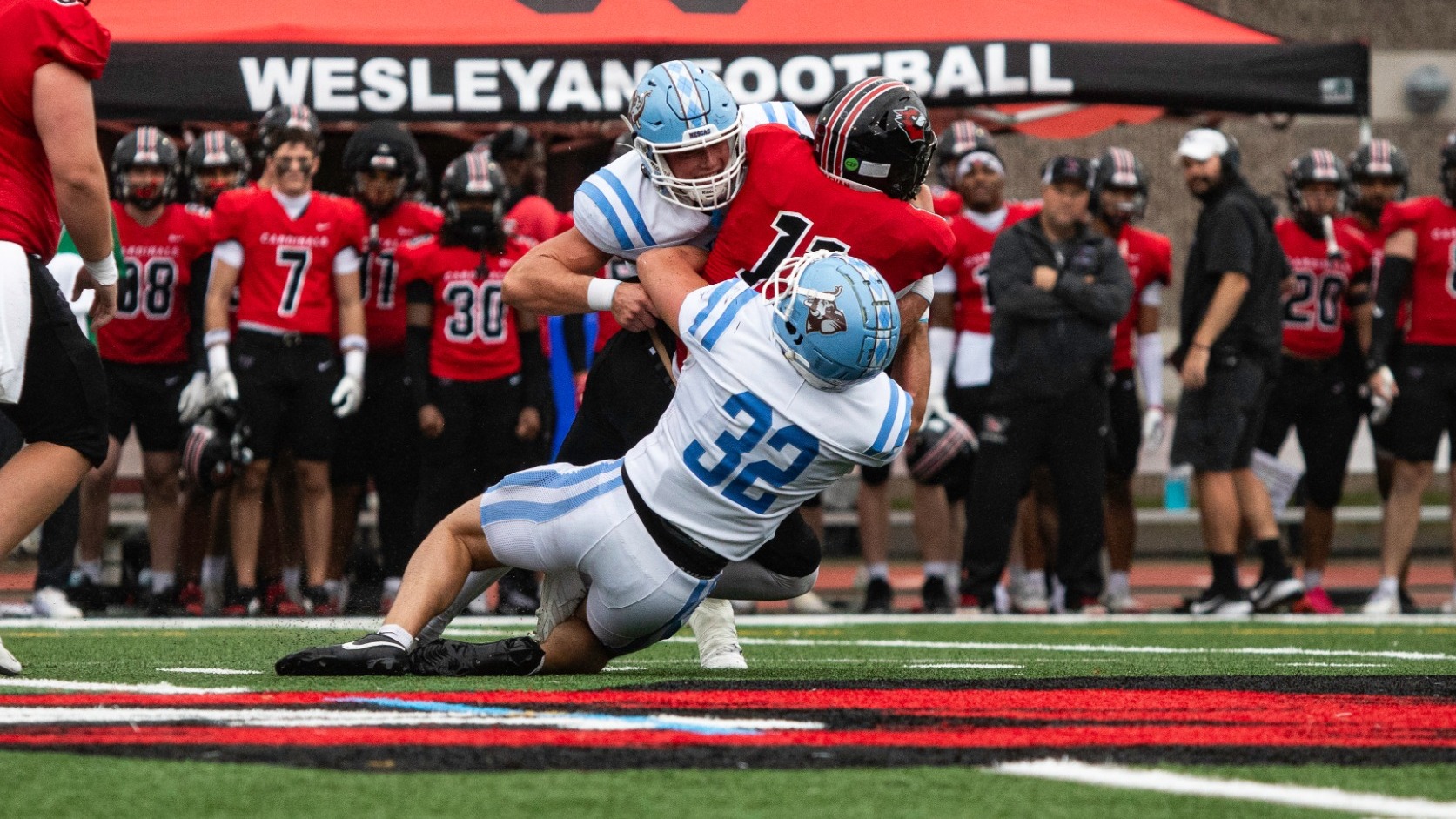 Ryan Horigan and Riley Yaker Make a Tackle Agianst Wesleyan 9.26.26.