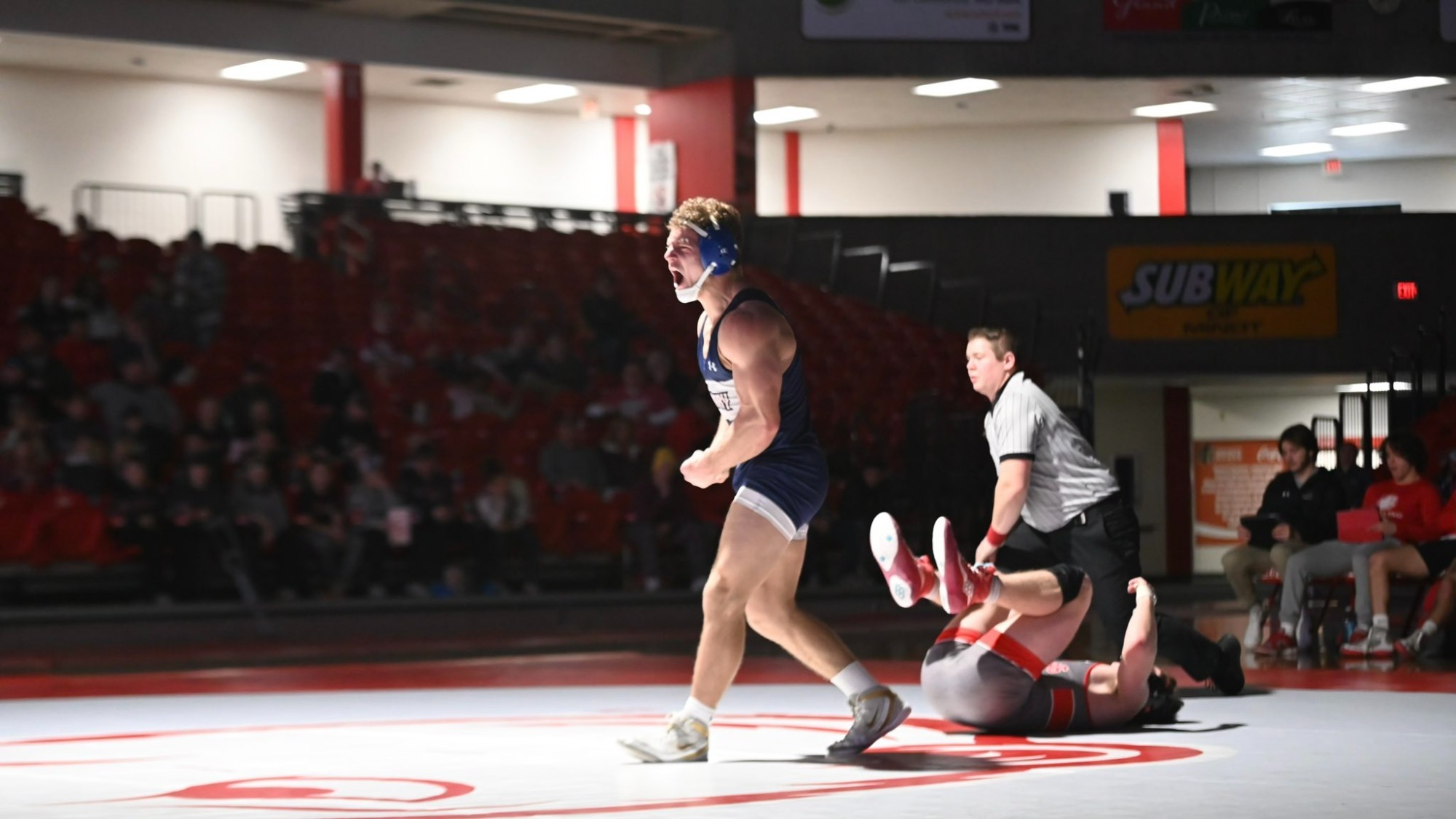 Wyatt Lidberg roars in victory over Minot opponent
