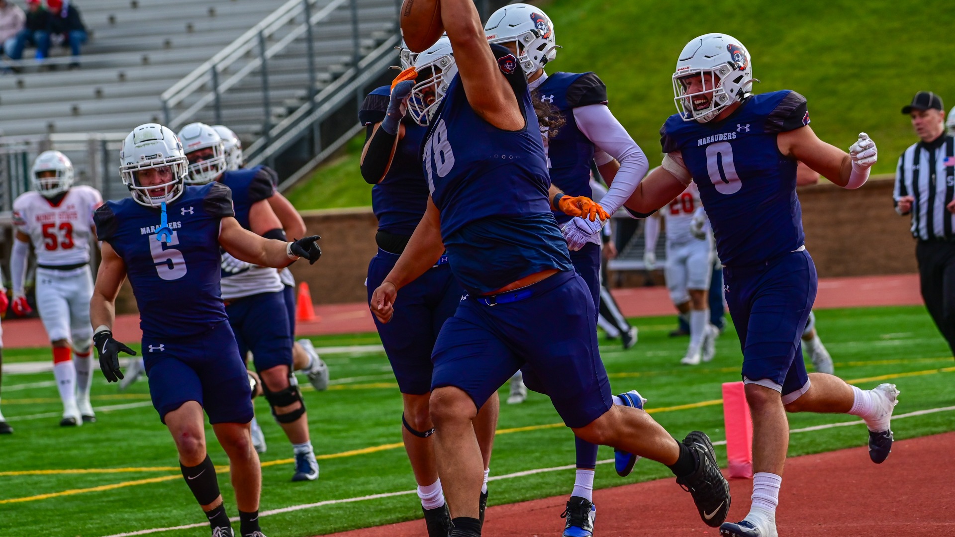 Timo Fua celebrates a touchdown
