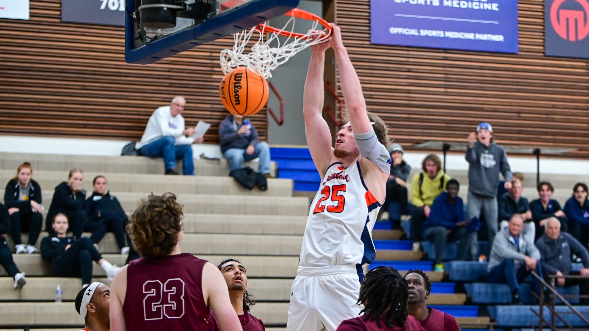 Jackson Ware dunks the ball