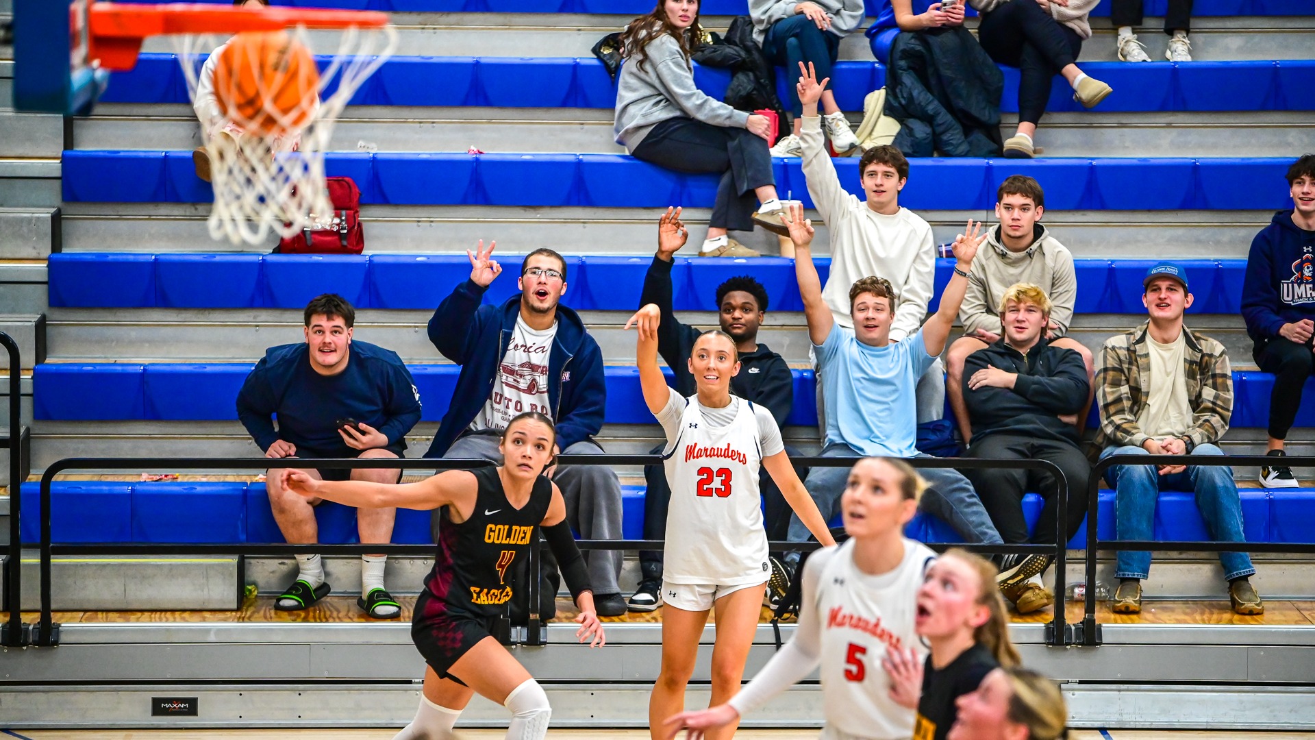 Emily Jaenke drains a trey in front of home crowd