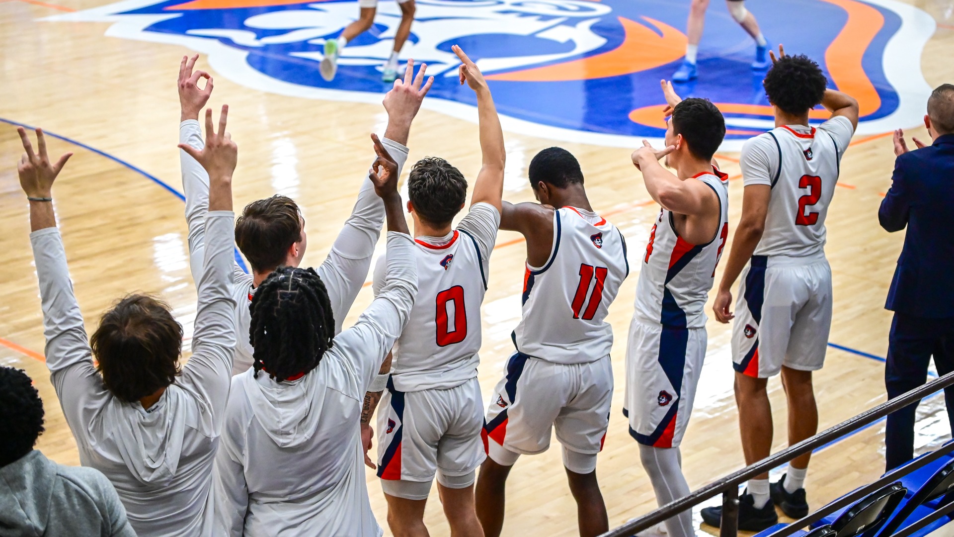 Bench celebrates a trey