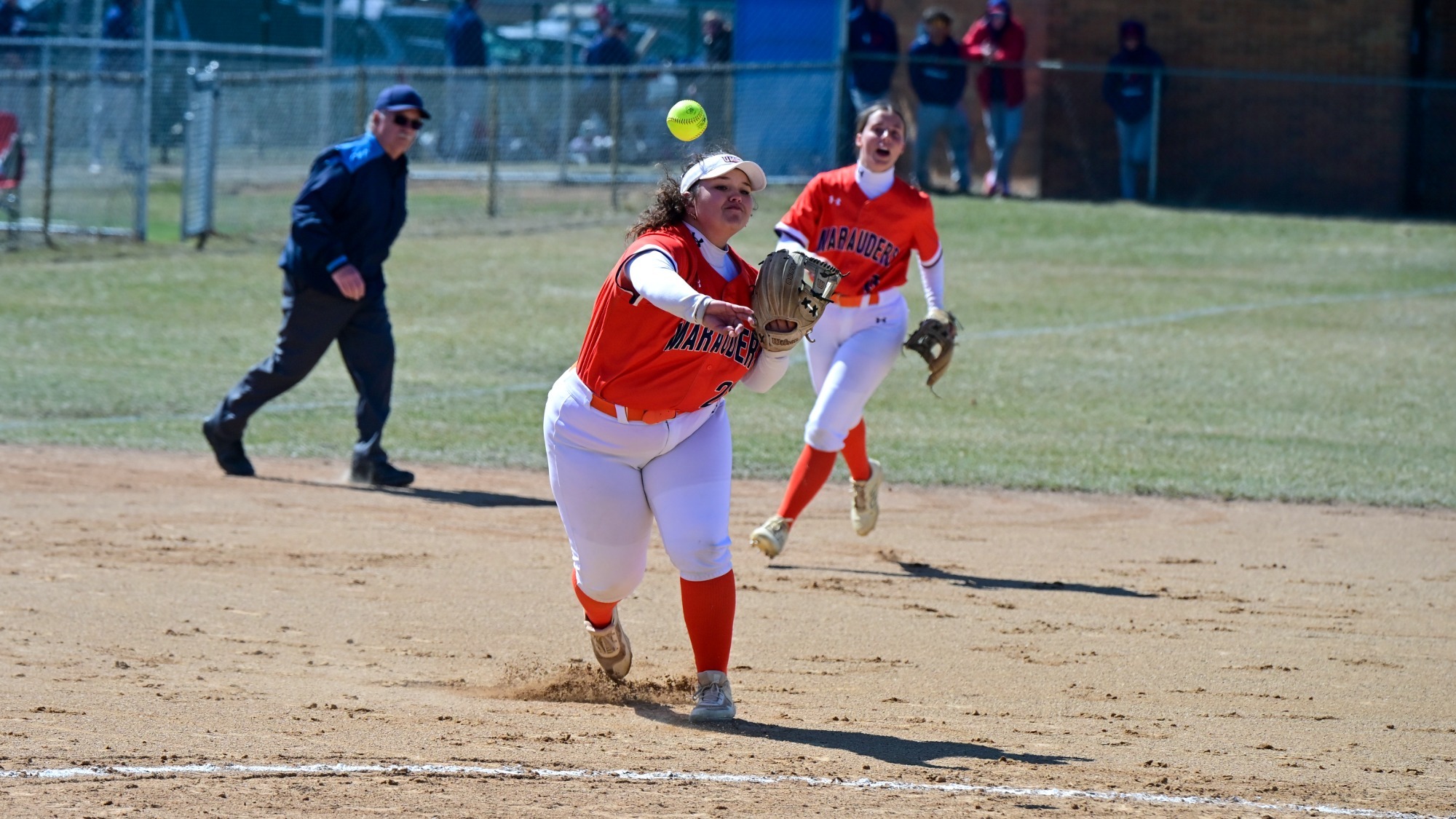 Francesca Villaneda throwing to first