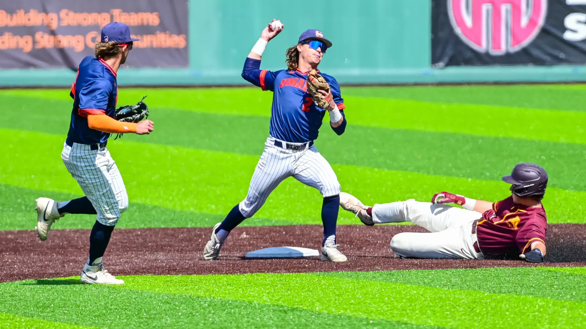 Kalem Haney throws to first