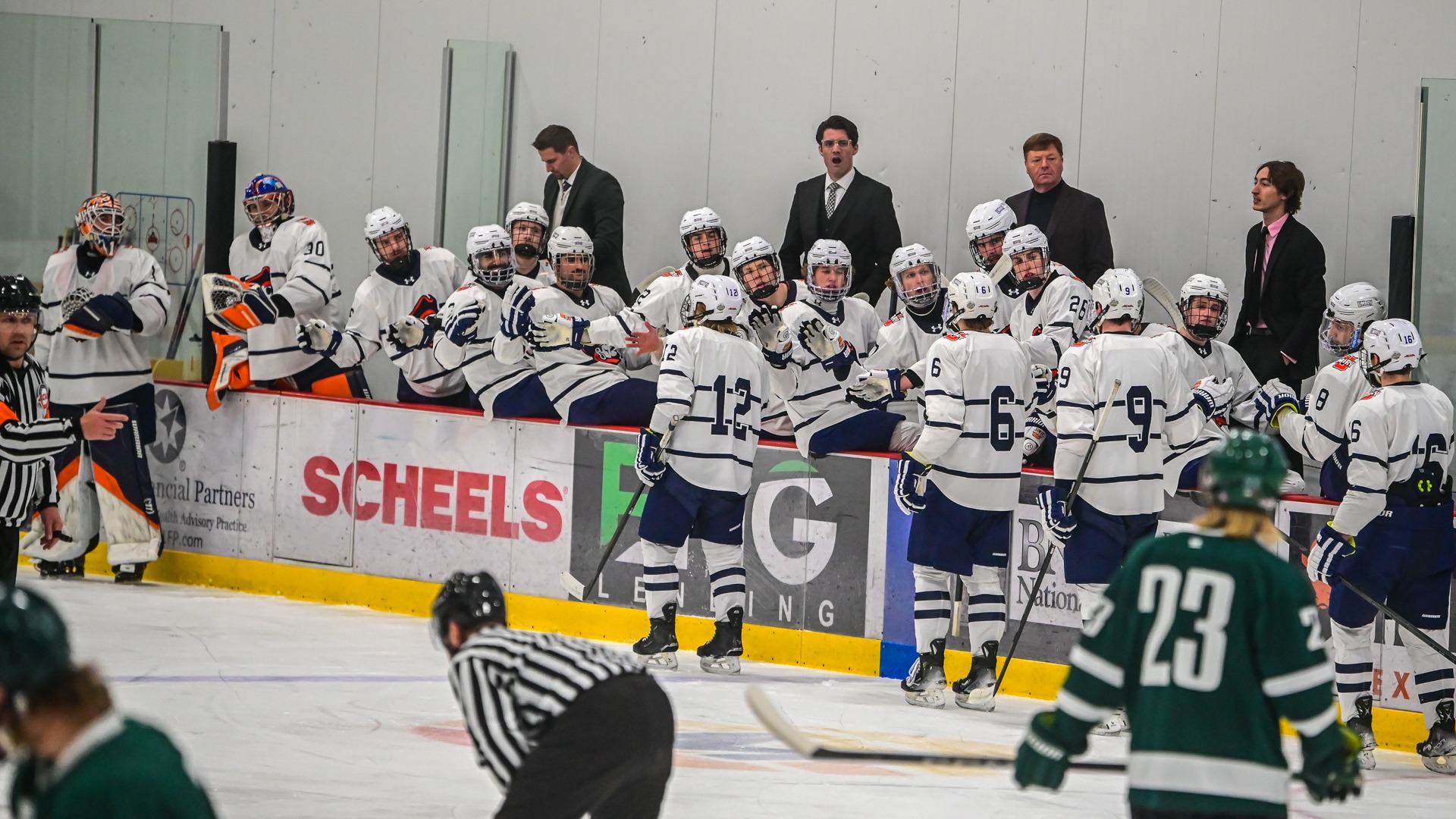 Marauders bench celebrates goal