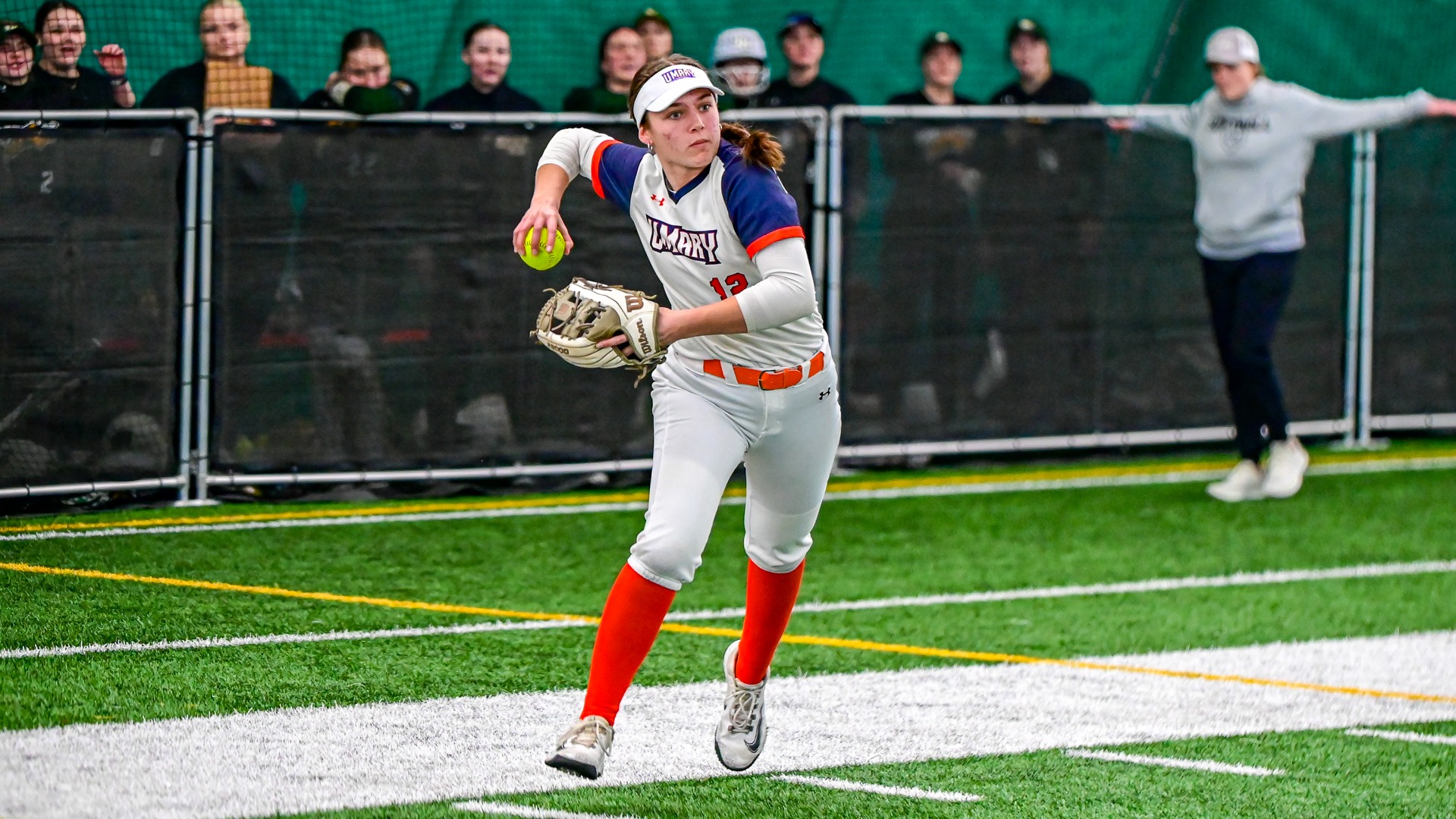 Daisy Sparrow throwing to first