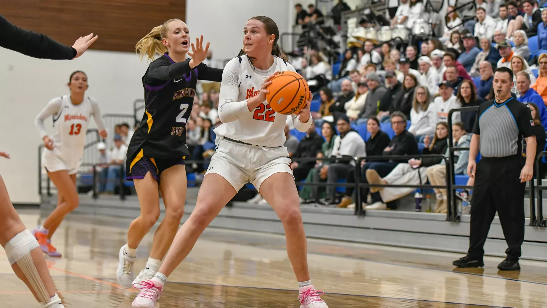 Cassie Erickson looks to move ball