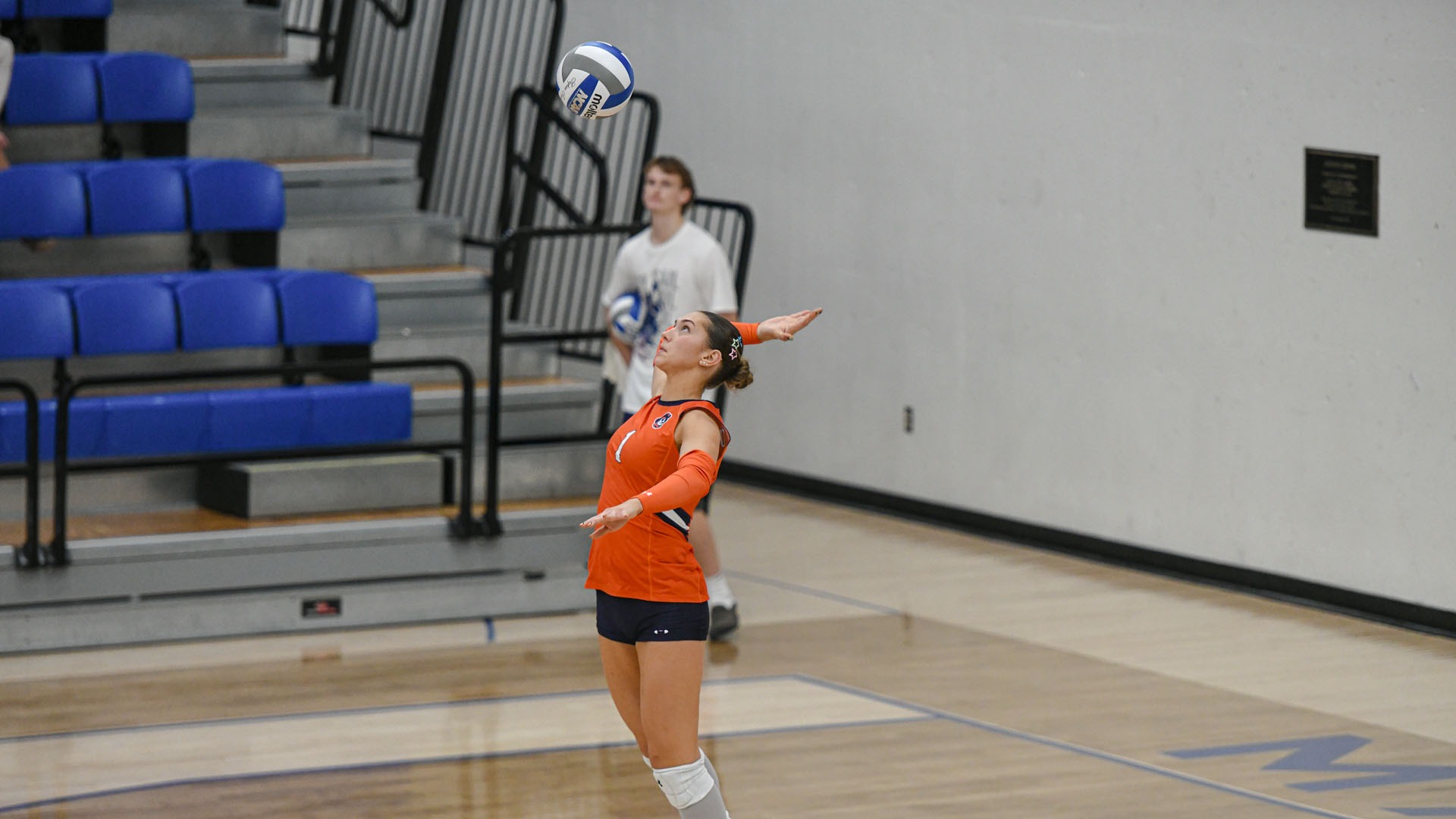 Judith Burke serve against UJ