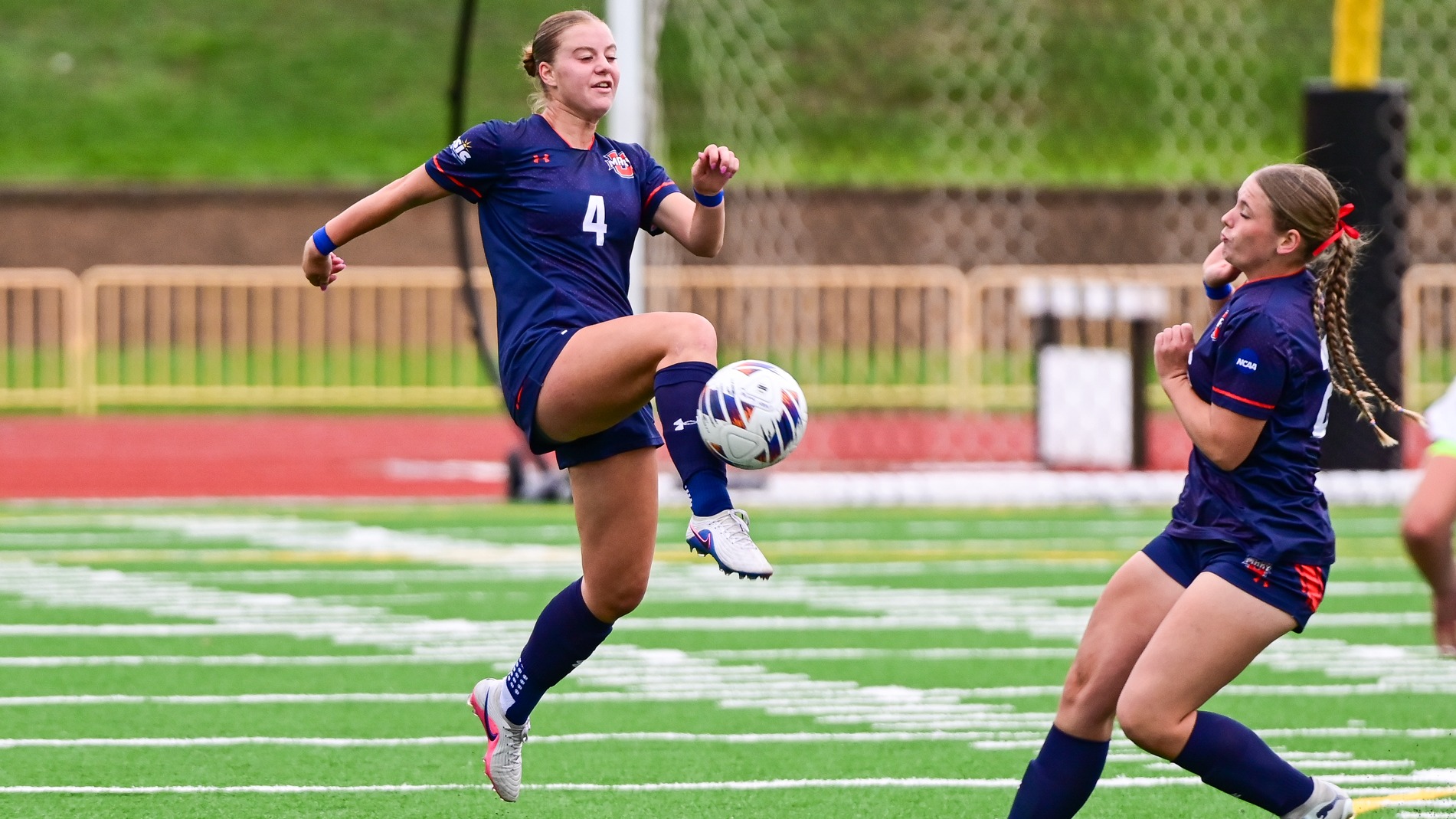 Lily Schatz attacks ball