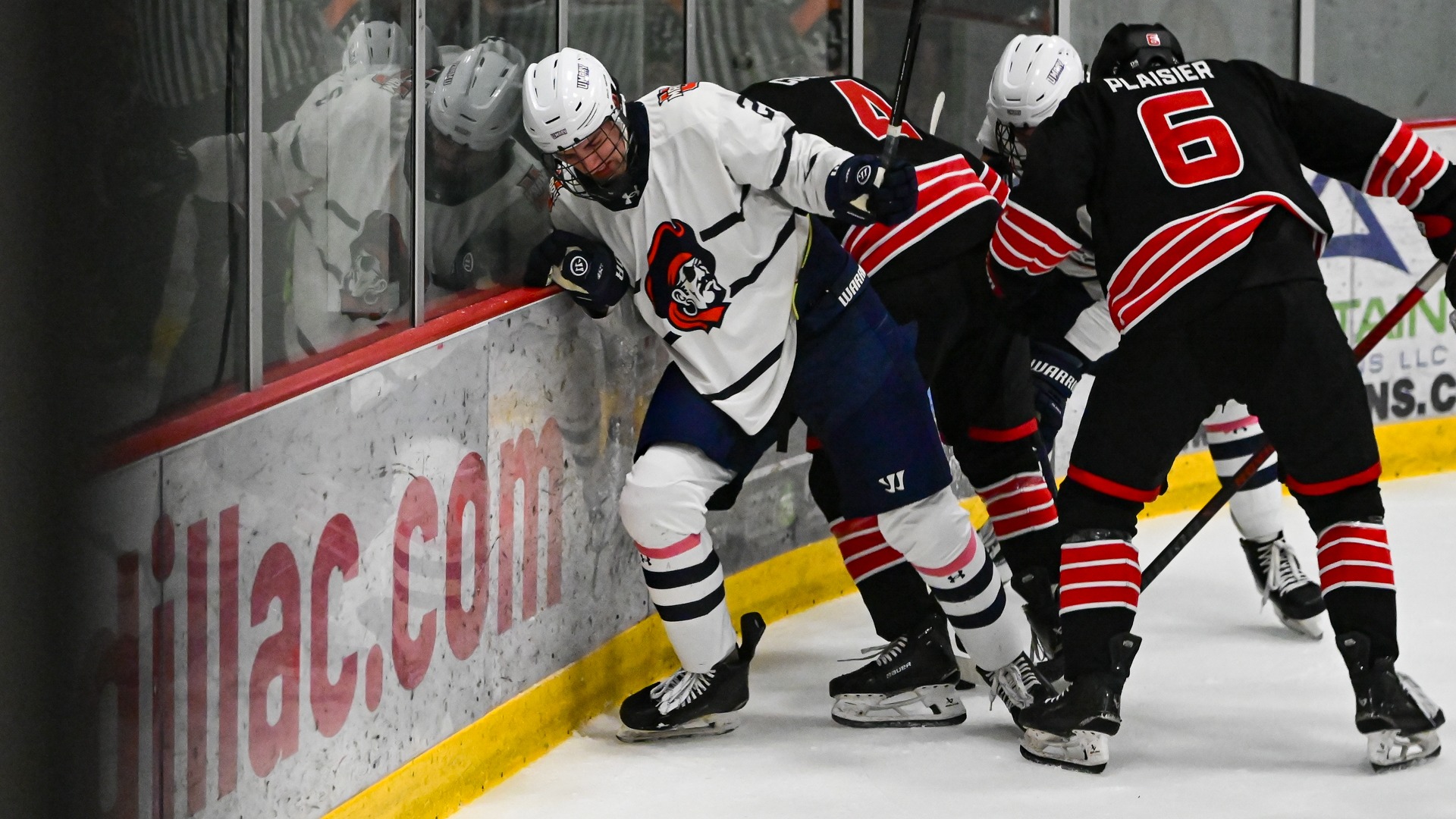 Isaac Flatley digging out the puck