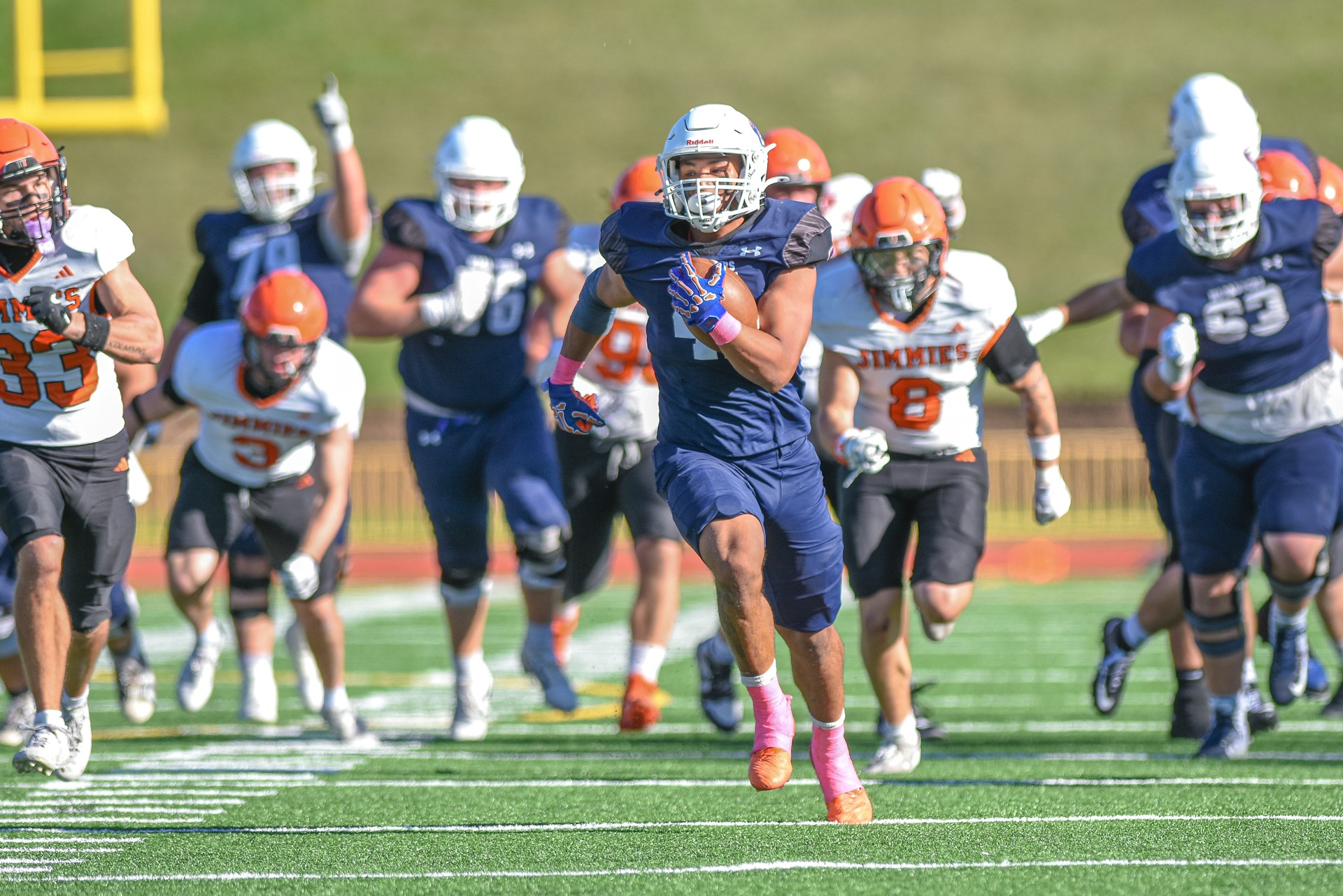 Xavier Brackenridge pulls away from Jimmies defenders