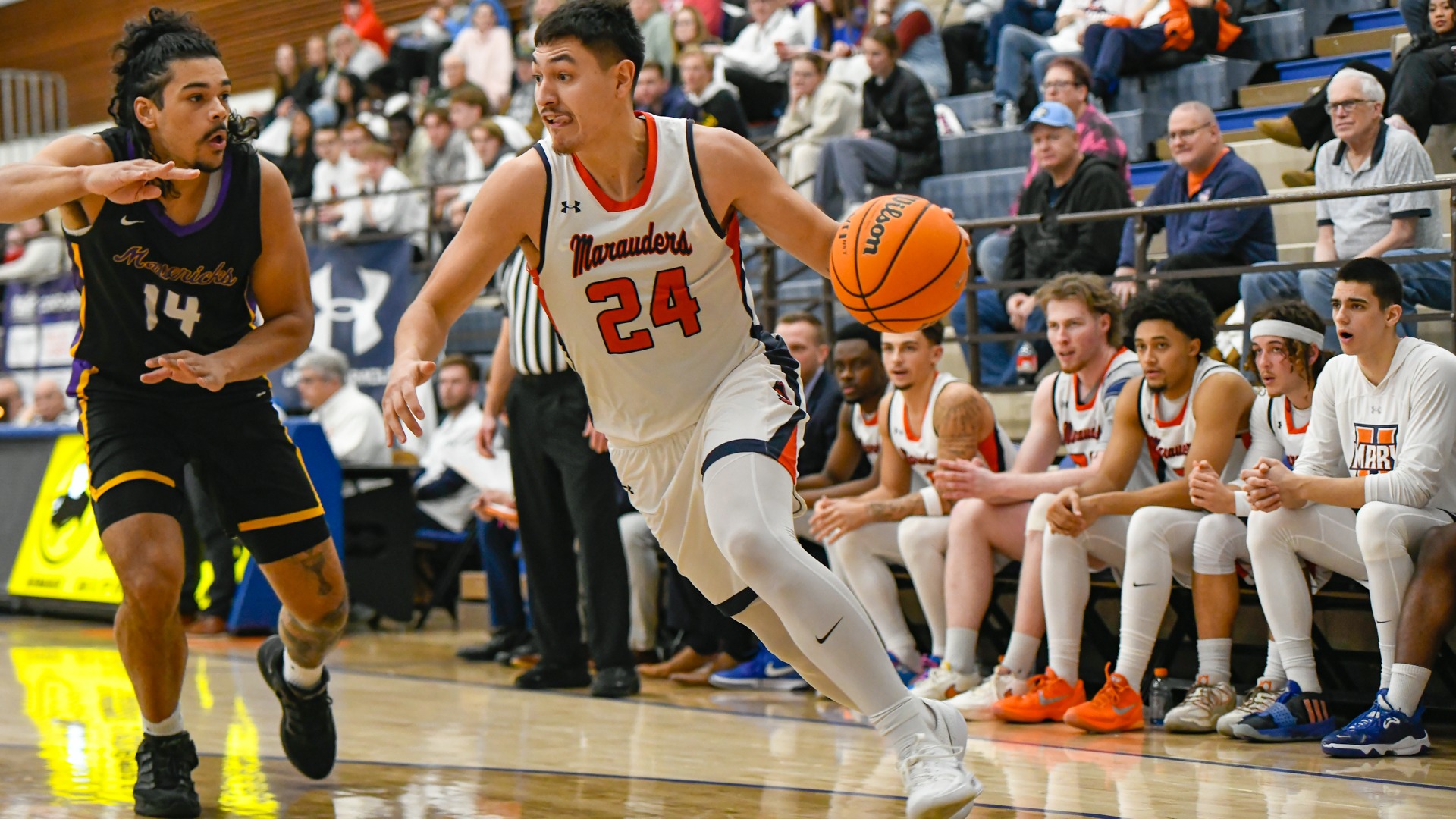 Cayden Redfield drives baseline