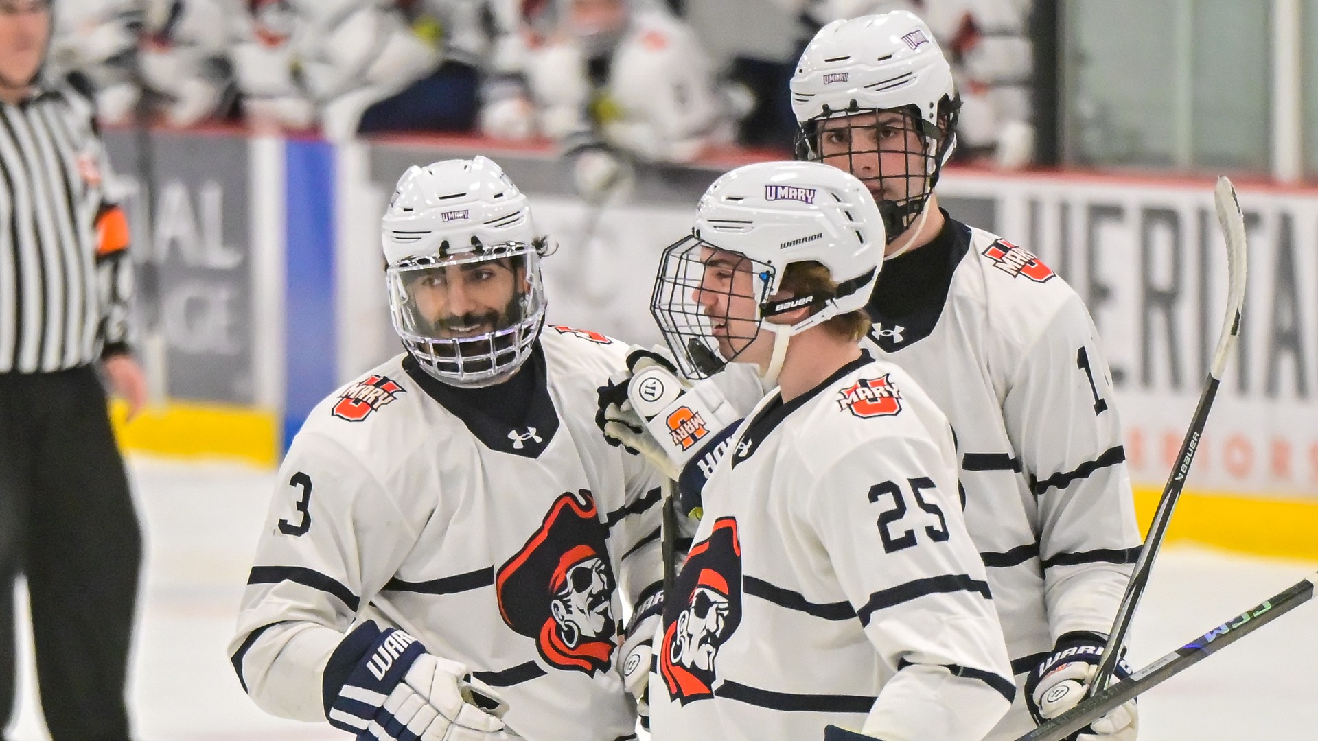 Amraj Gill and John Lang celebrate after a goal