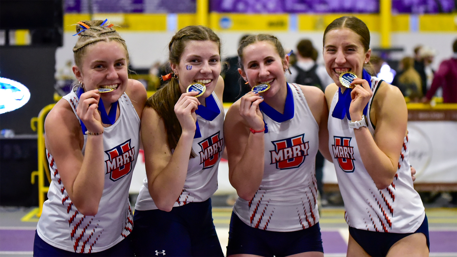 UMary celebrates DMR victory