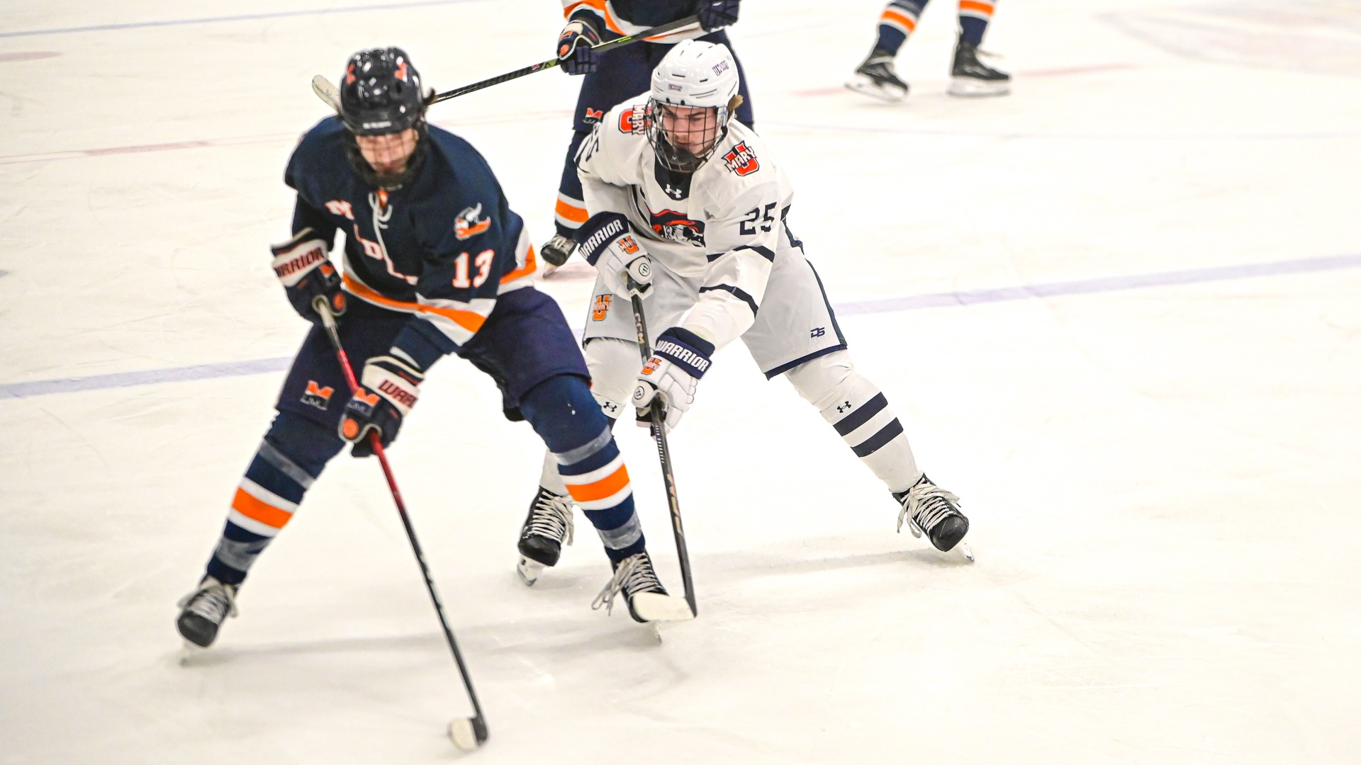 John Lang goes for puck