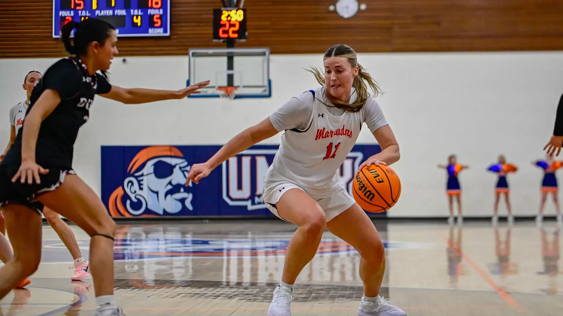 Chloe Pfau works her defender