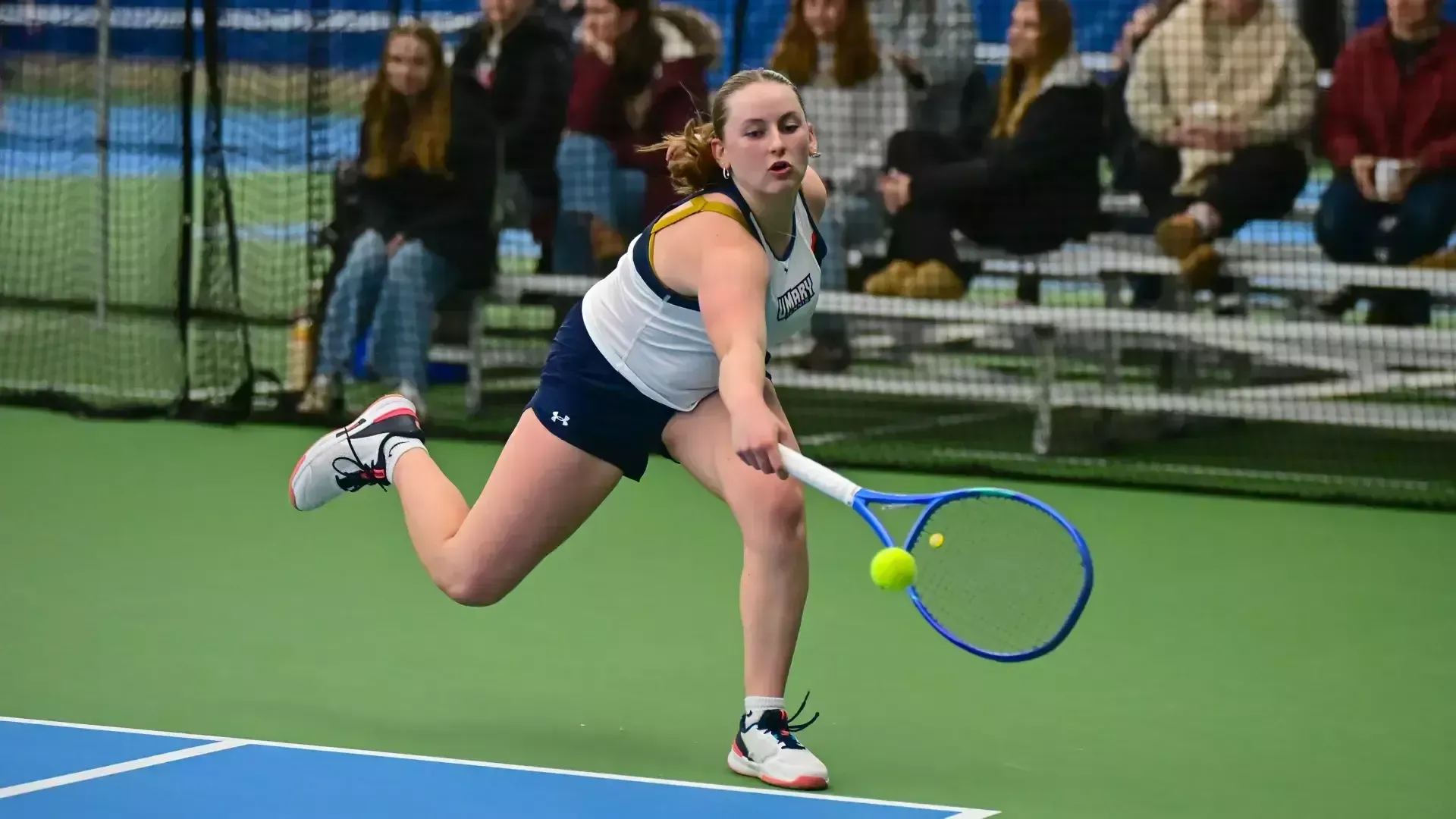 Josie Sueflohn stretches for ball