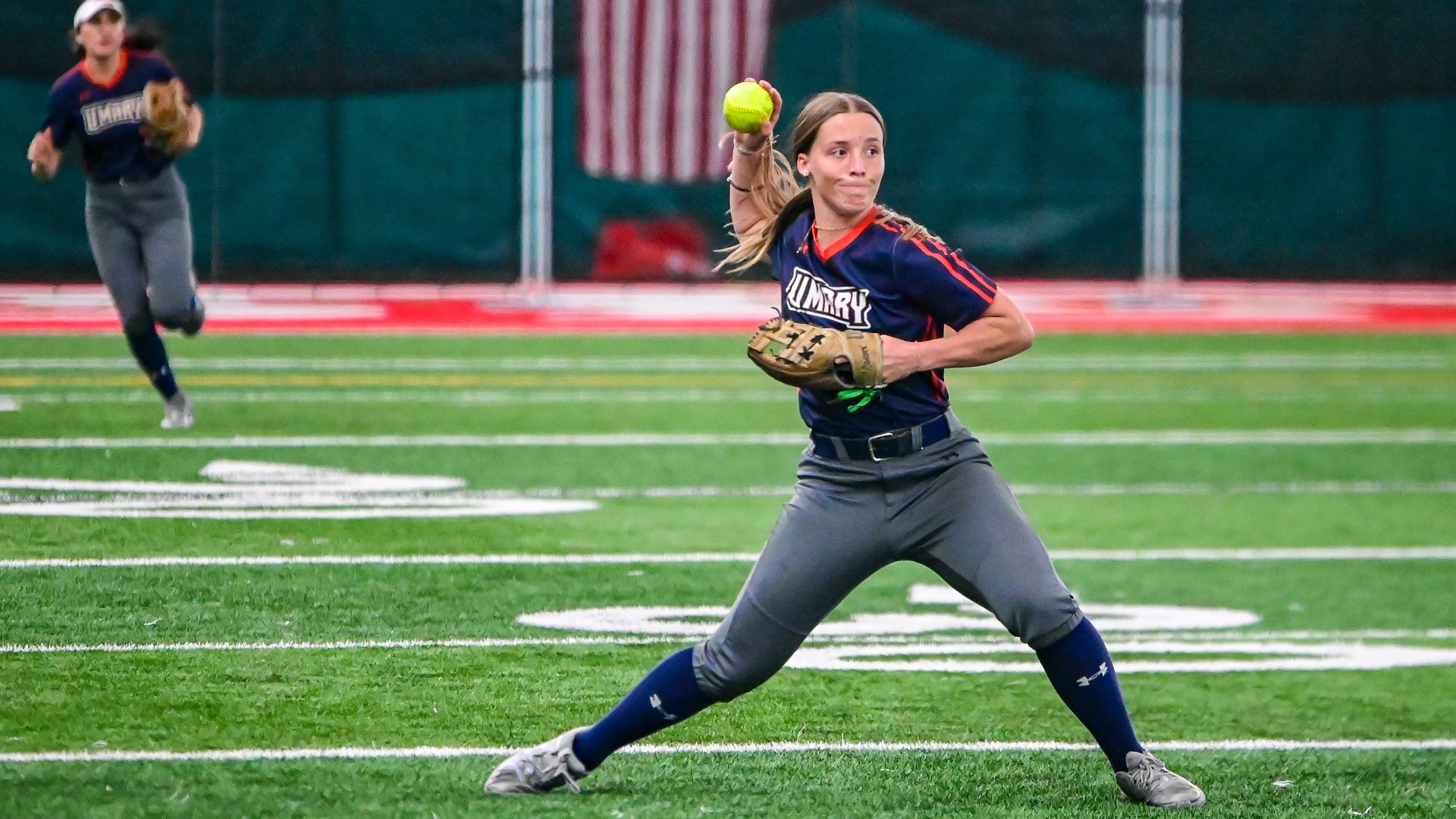 Genevieve Hastings throwing runner out