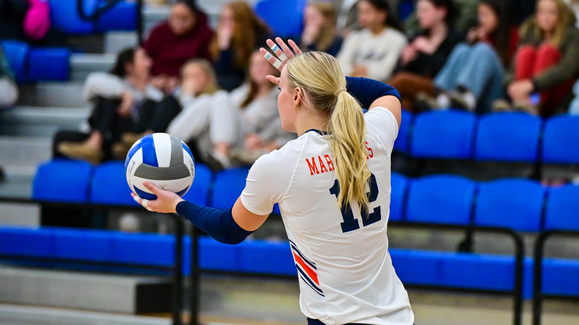 Natalie Boehmer preparing to serve