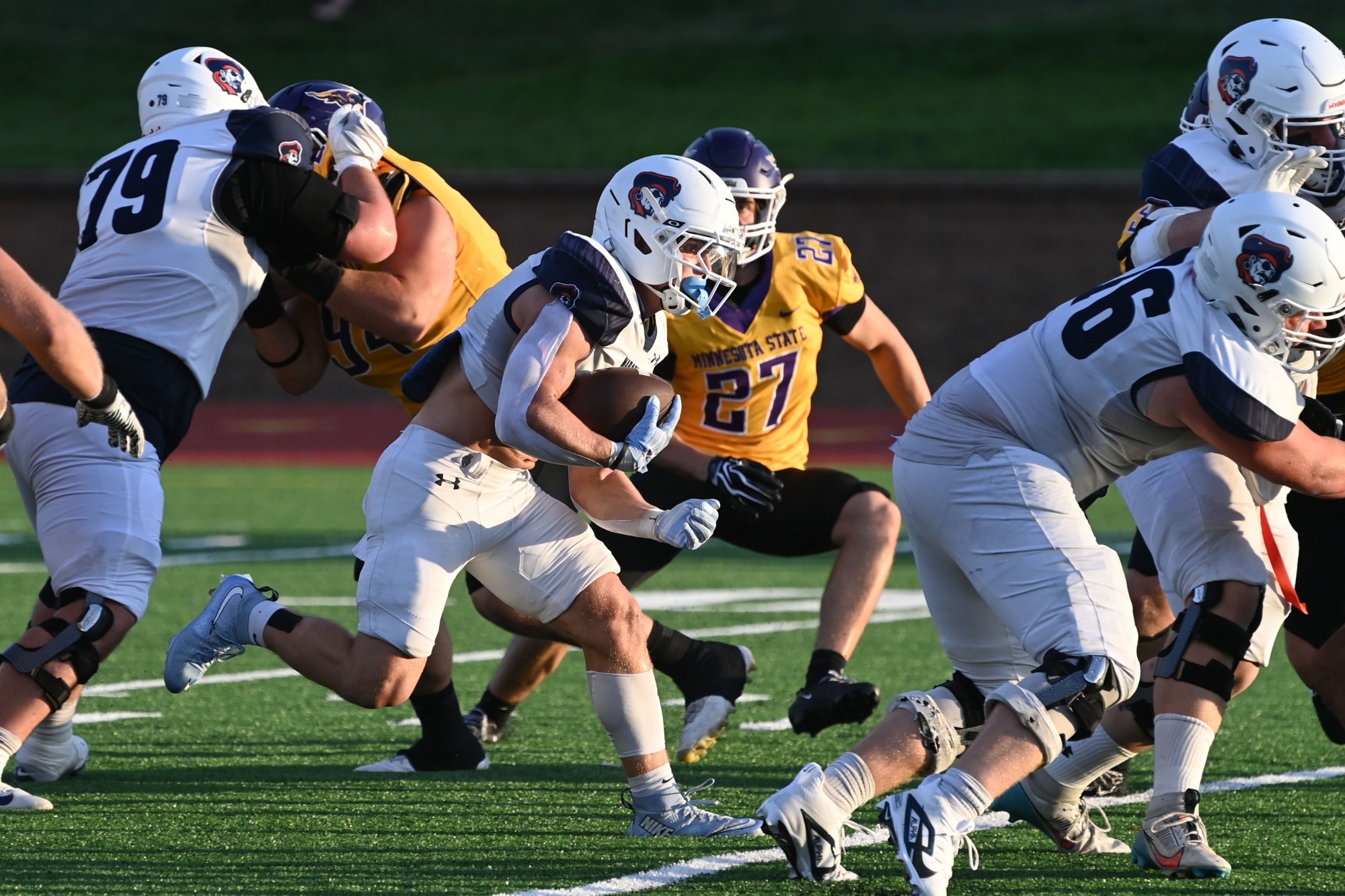Andrew Trandahl runs through the line