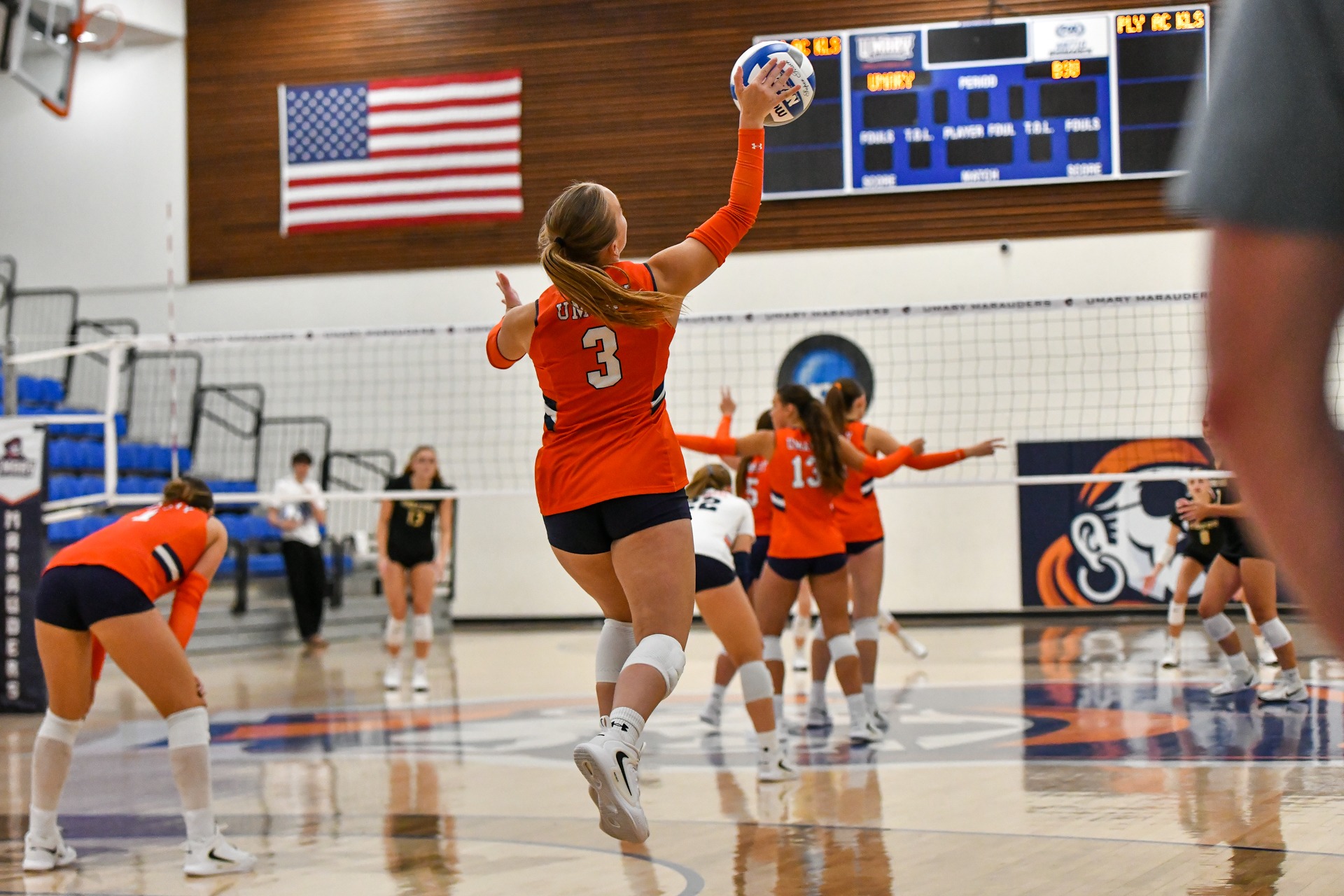 Chloe Solheid serving
