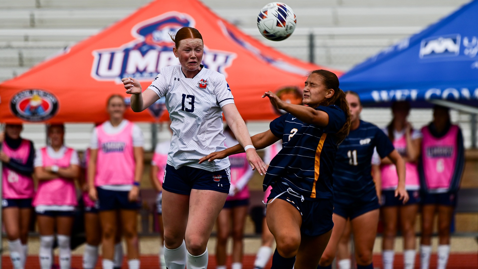 Alex Guinn rises for a header