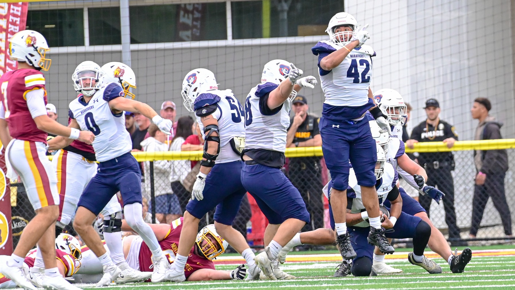 Marauders celebrate fumble recovery