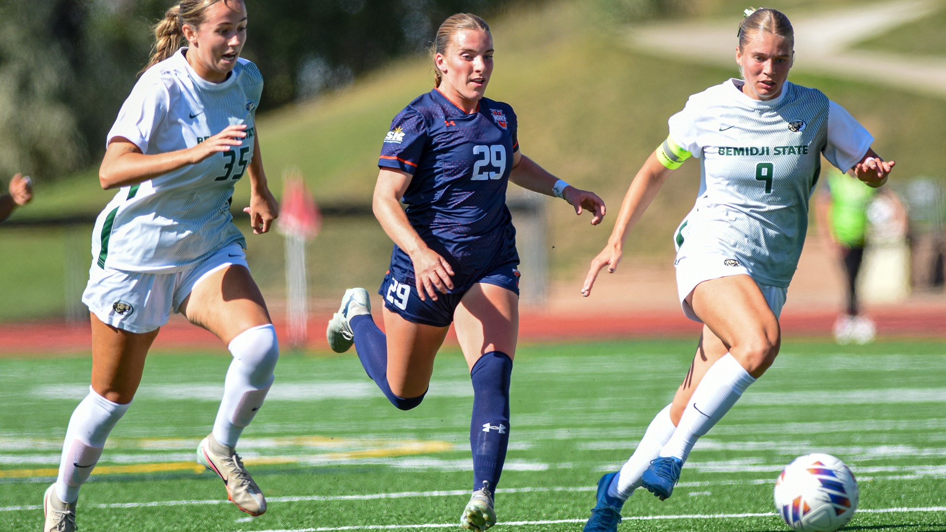Maggie Bono races down ball