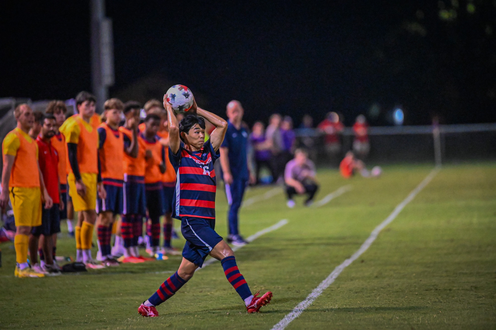 Ahiro Nakamae throws the ball in