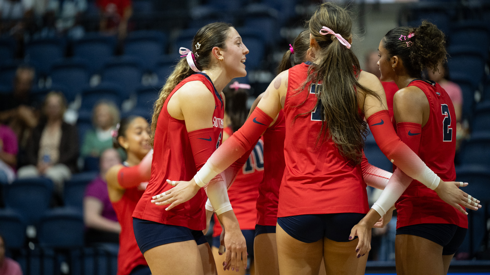 USI VB vs MSU Pink Day Team huddle