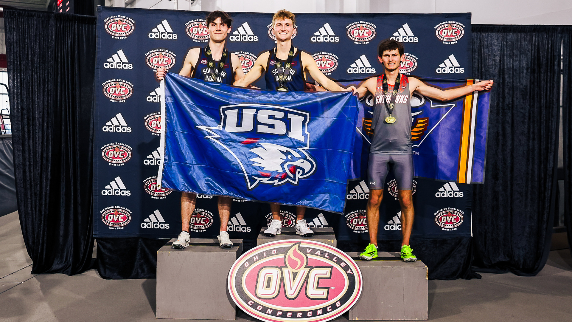Alex Nolan and Layden Wagoner on the podium after finishing first and second, respectively, in the 3,000 meters at the OVC Indoor Championships in Louisville, Kentucky, February 25, 2026.