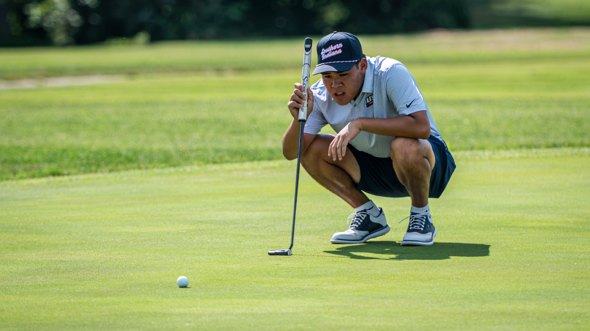 USI Men's Golf Ingtawan Wangrungwichaisri lining up putt during practice round on August 27, 2026.