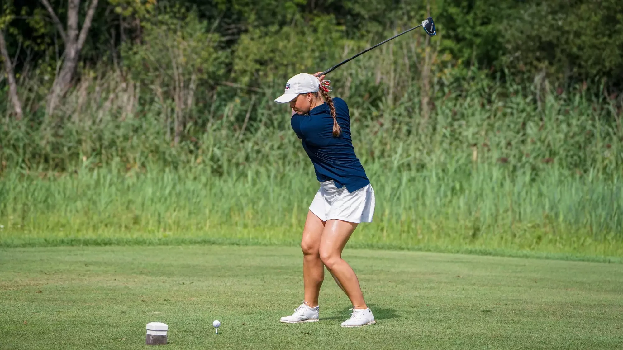 USI Women's Golf Tora Timinsky swinging at the Midwest Match Play.