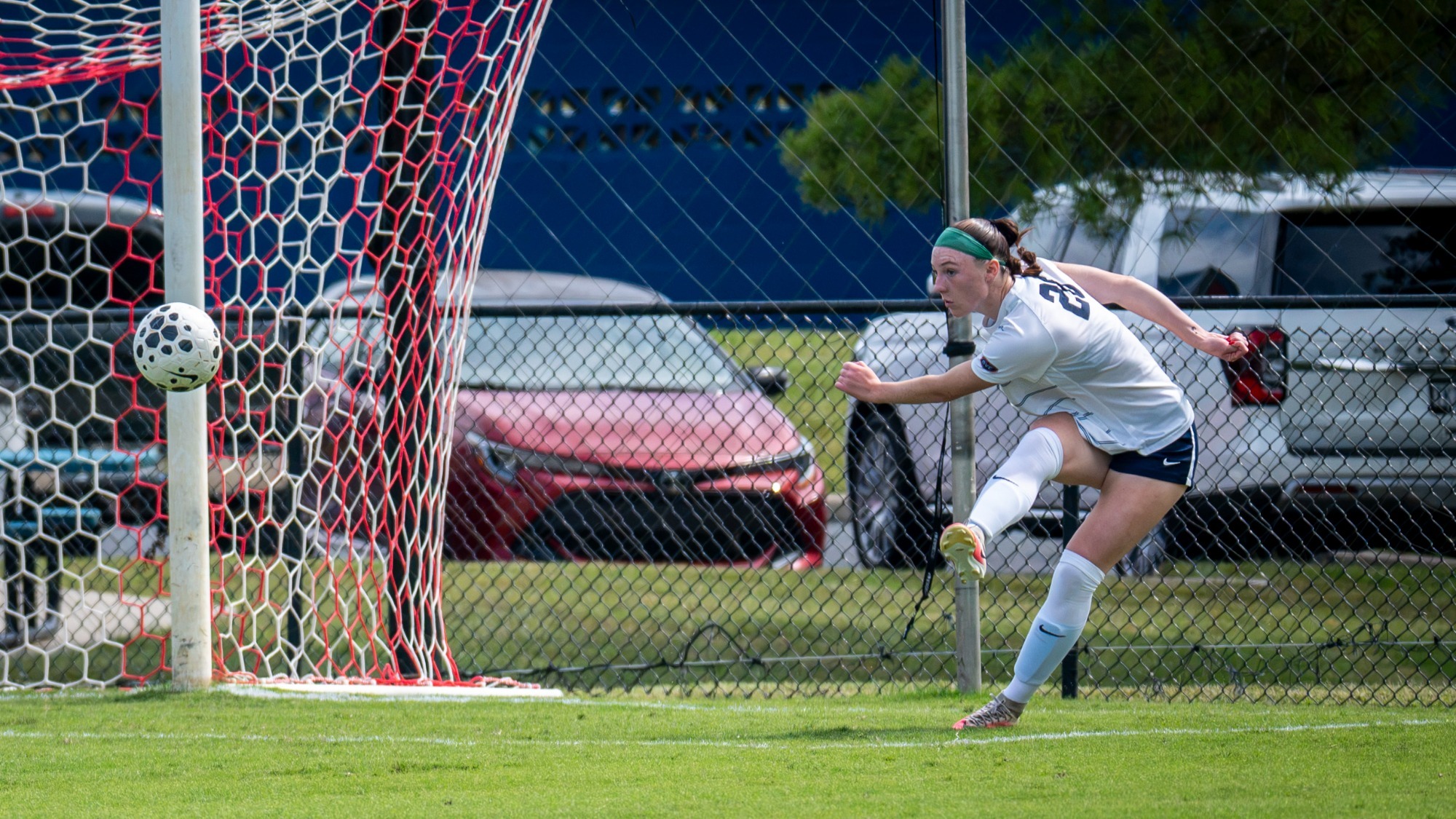 USI Women's Soccer Tierney Mullady kicking the ball against UT Martin.