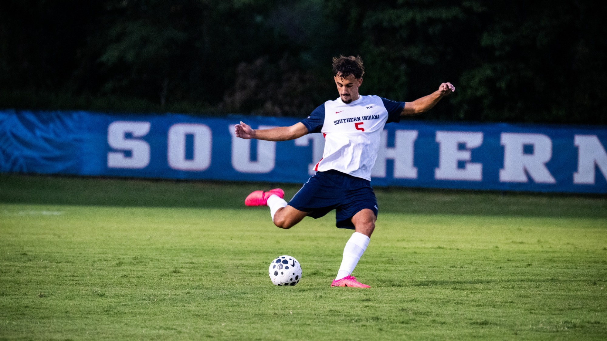 Zach Naessens kicks the ball