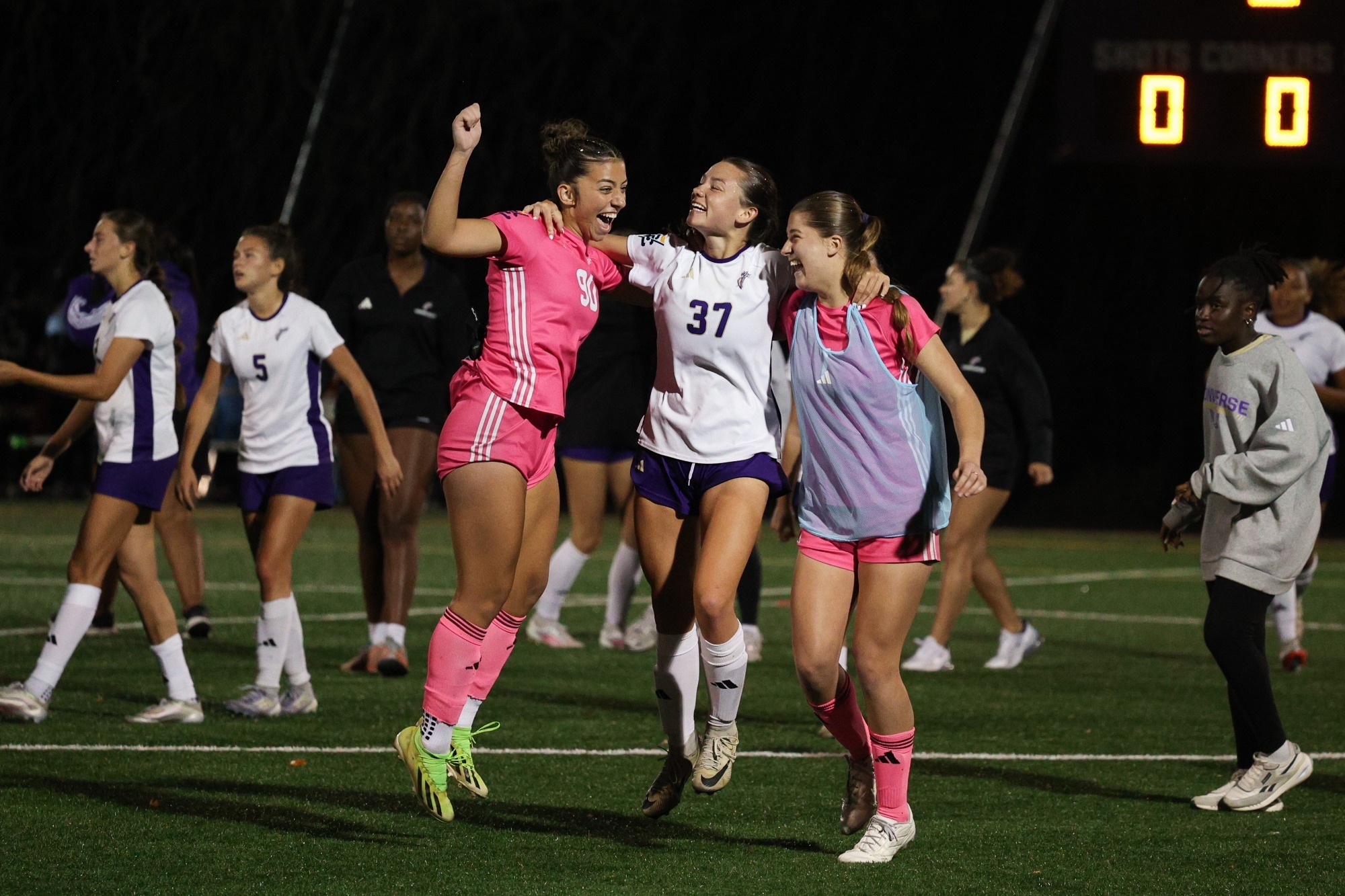 Julia Salo, Sam Quillen and Gabriella Gudeman celebrate a 2-0 Converse win over NGU