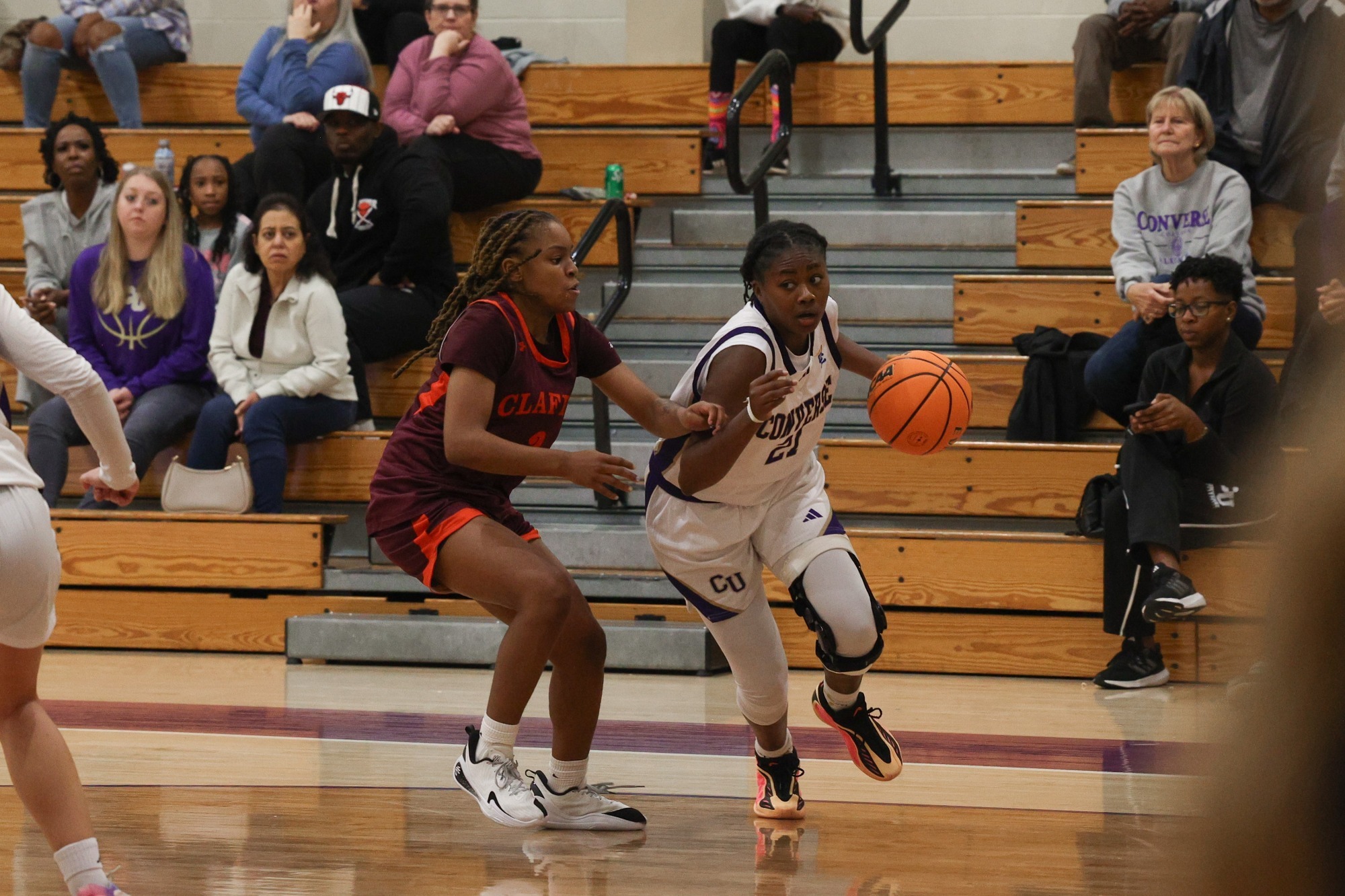 Janiyah Hagood dribbles past a defender