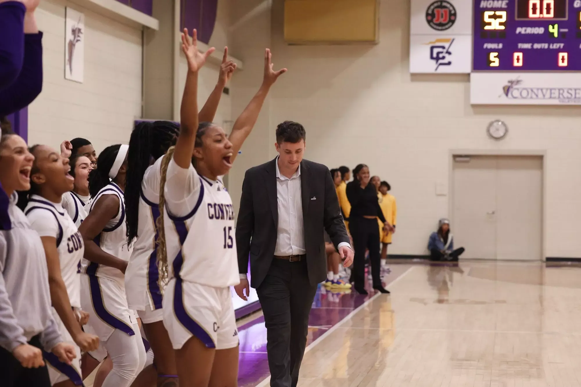 Kevin Lyons enjoys his first career win while the team celebrates