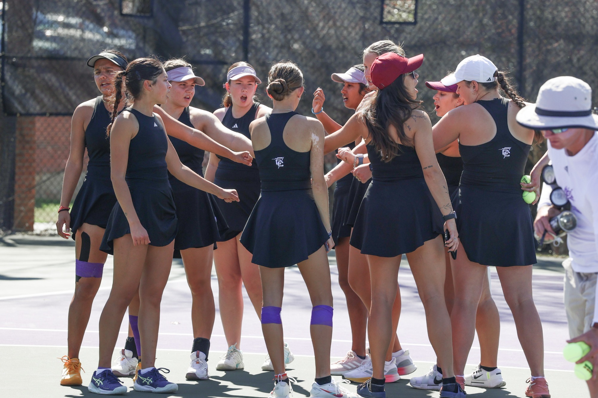 Women's Tennis Team huddle