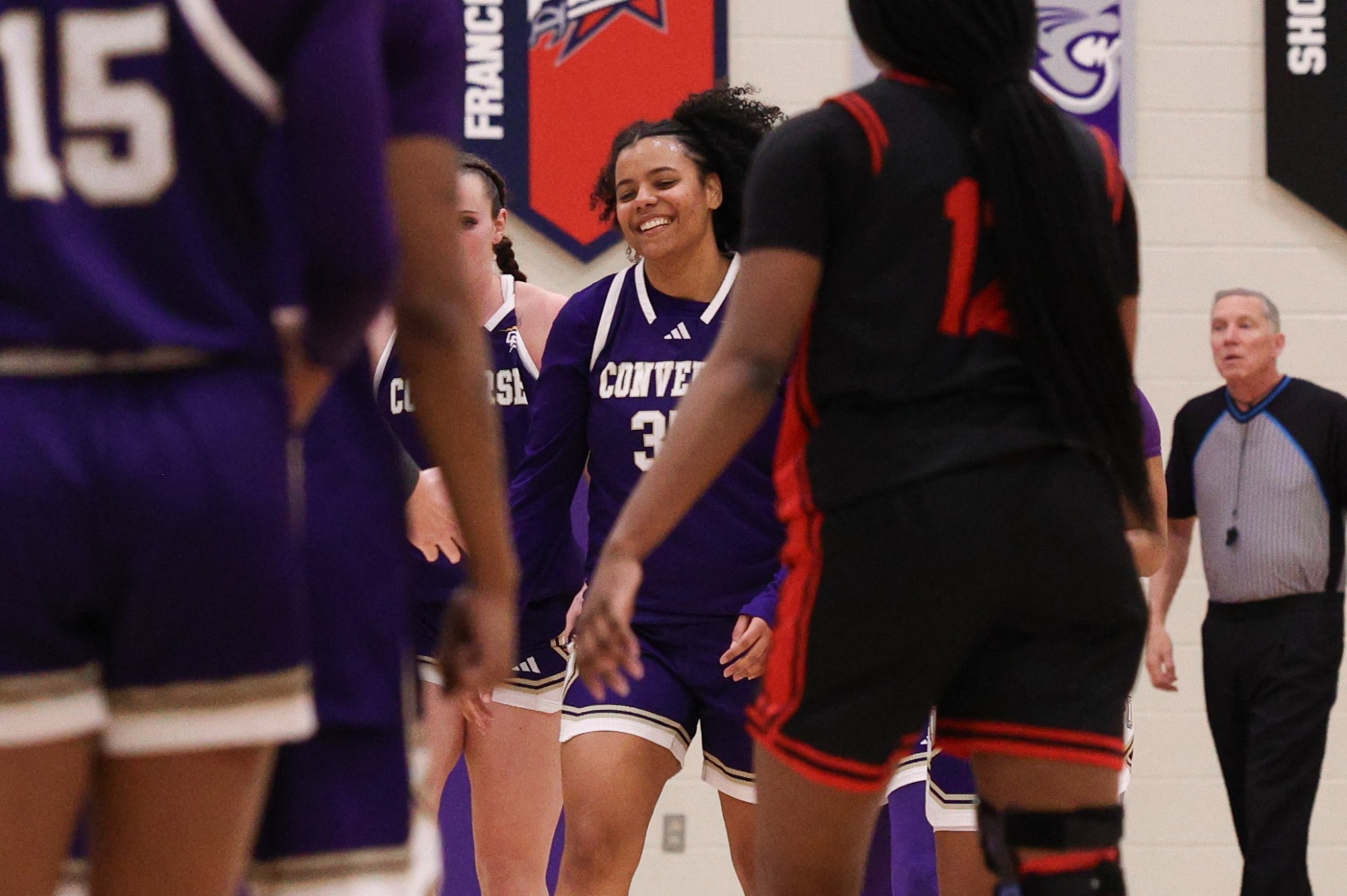 Tatiana Brown smiles on-court during a victory over NGU