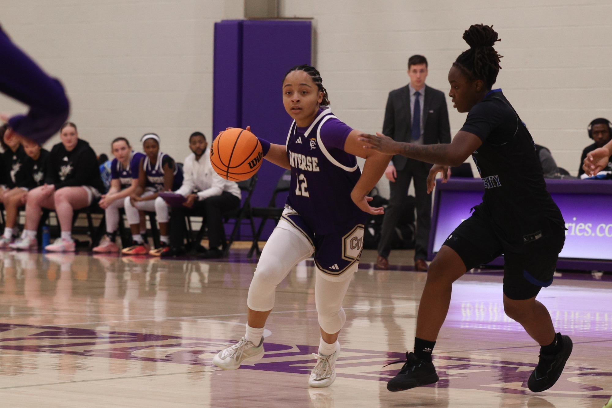 Madison Fileen dribbles against Shorter