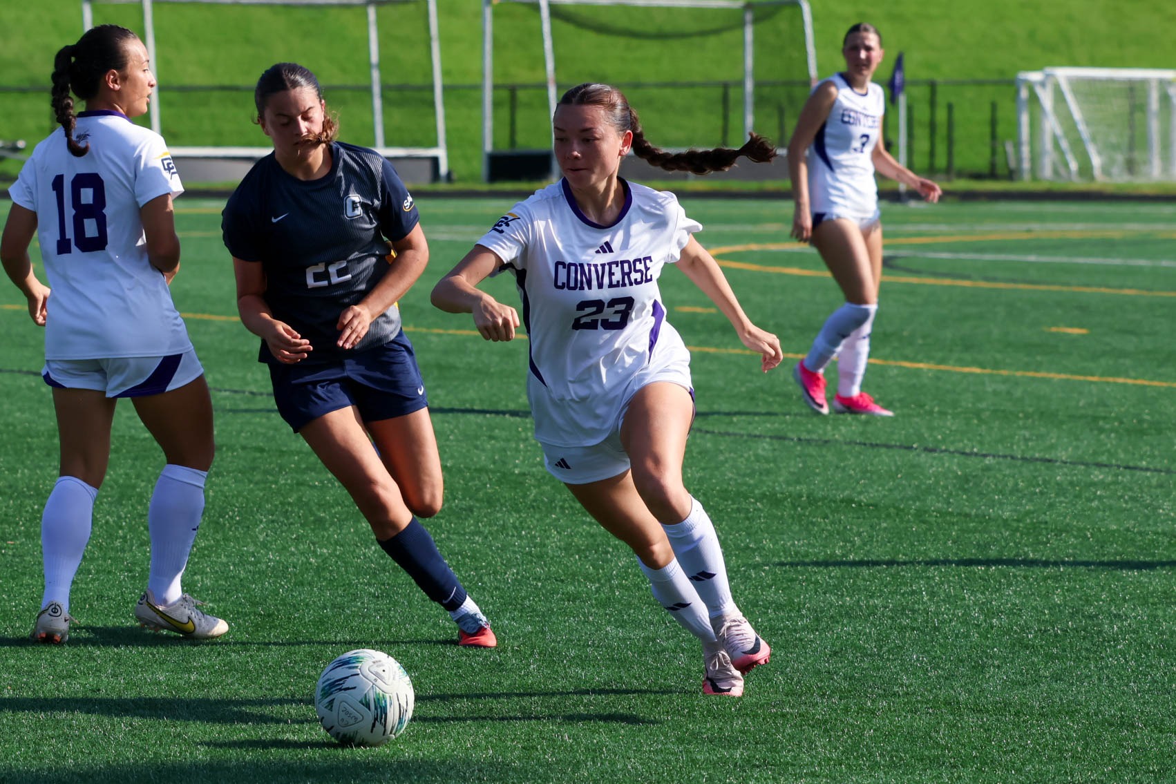 Samantha Quillen dribbles the ball past a Coker defender
