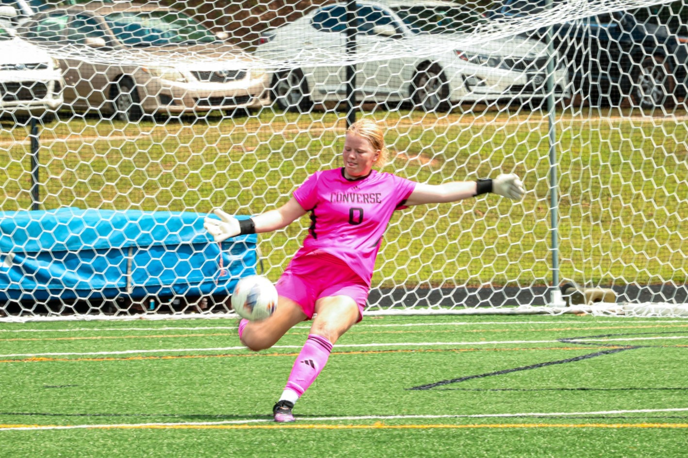Reese Haynes drop kicks the ball at Weisiger Stadium