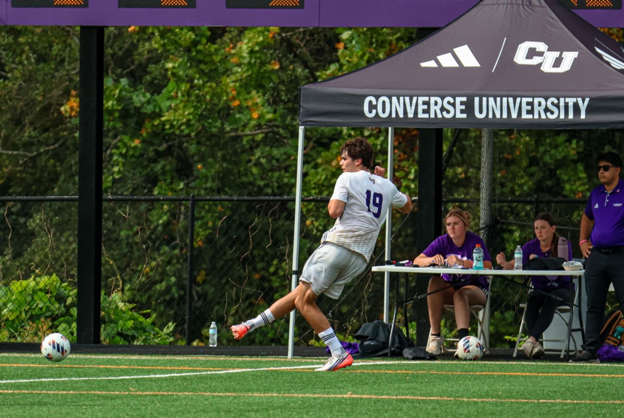 Owen Nero kicks the ball