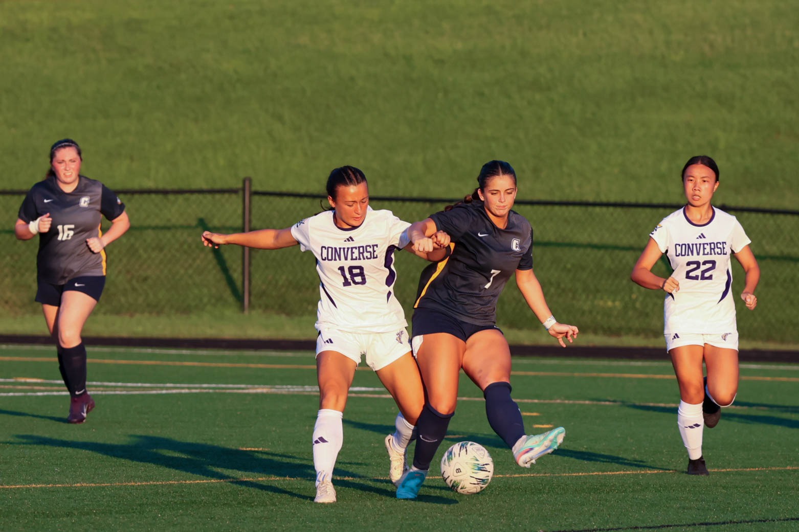 Brianna Berry fights for the ball with an opposing player